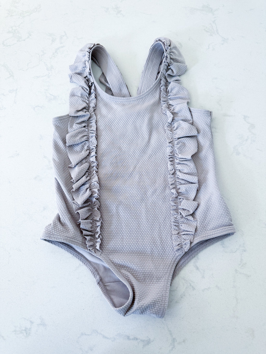 H&M- 3T- VGUC- light dusty purple ruffle swim suit with textured pattern