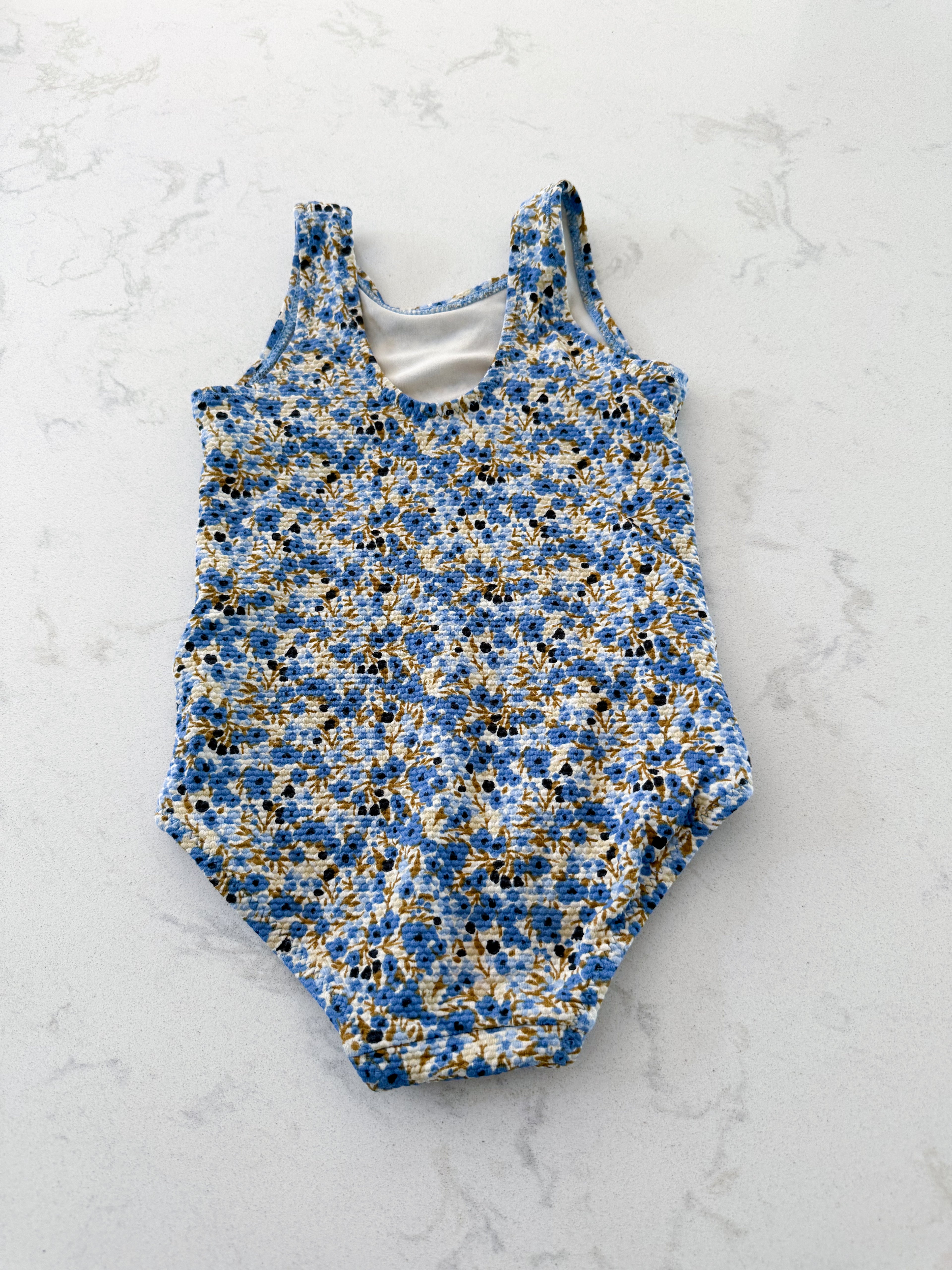 H&M- 2T- VGUC- textured tiny blue floral one piece bathing suit