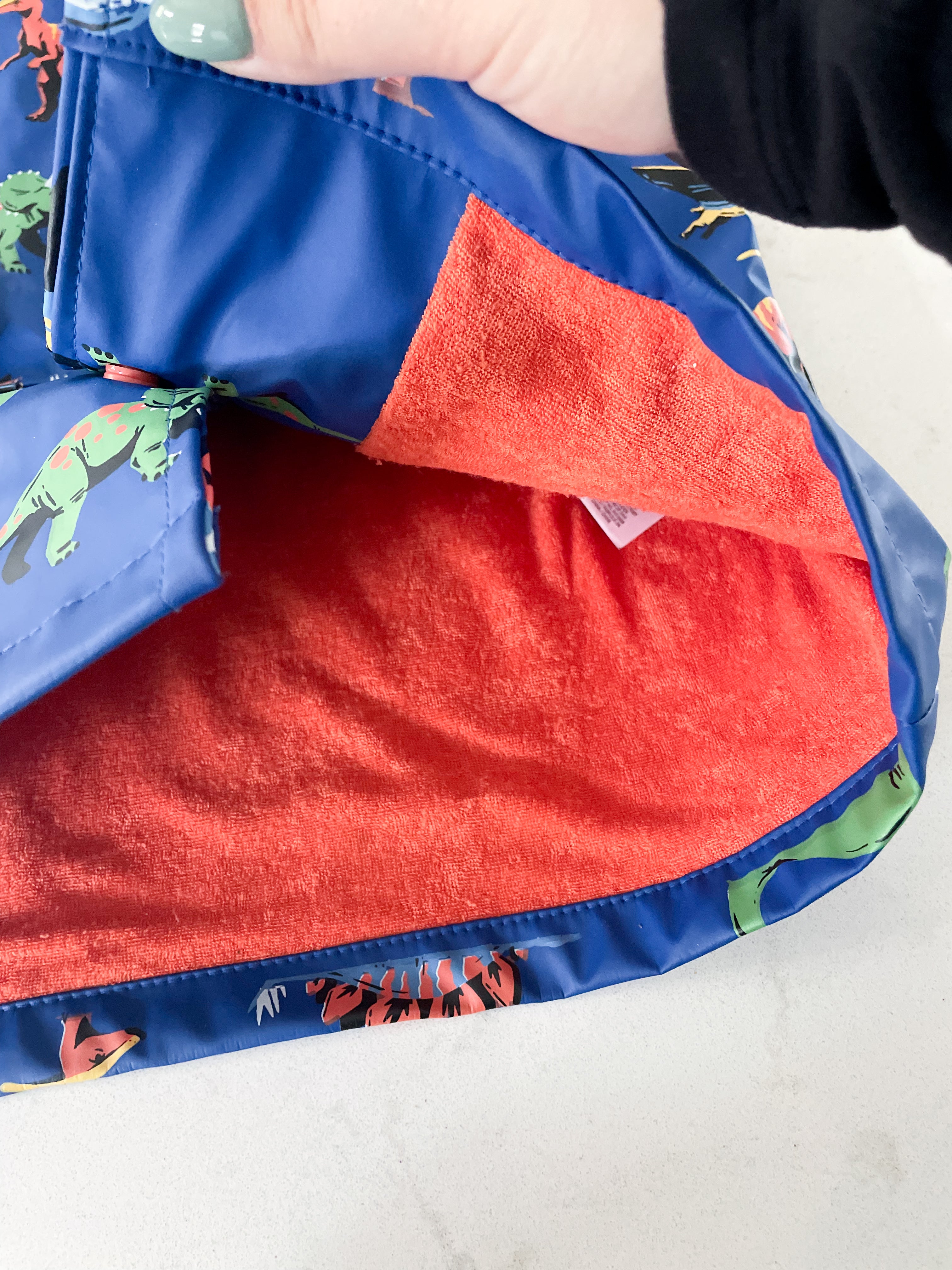 Hatley-4T-GUC-blue Rain coat with dinosaurs and Terry towel lining