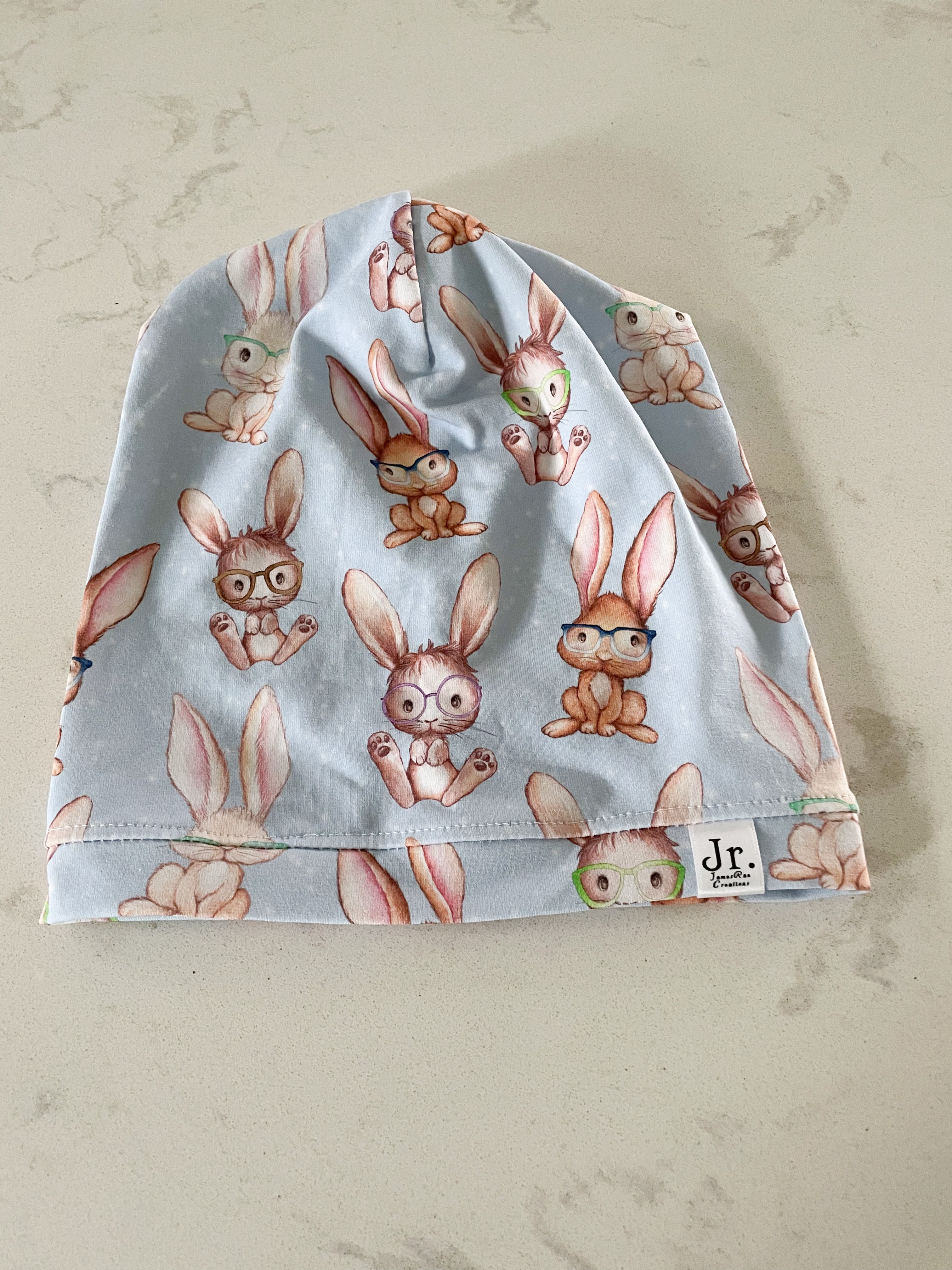James Rae Creations- kid- VGUC- light blue slouchy beanie with bunnies