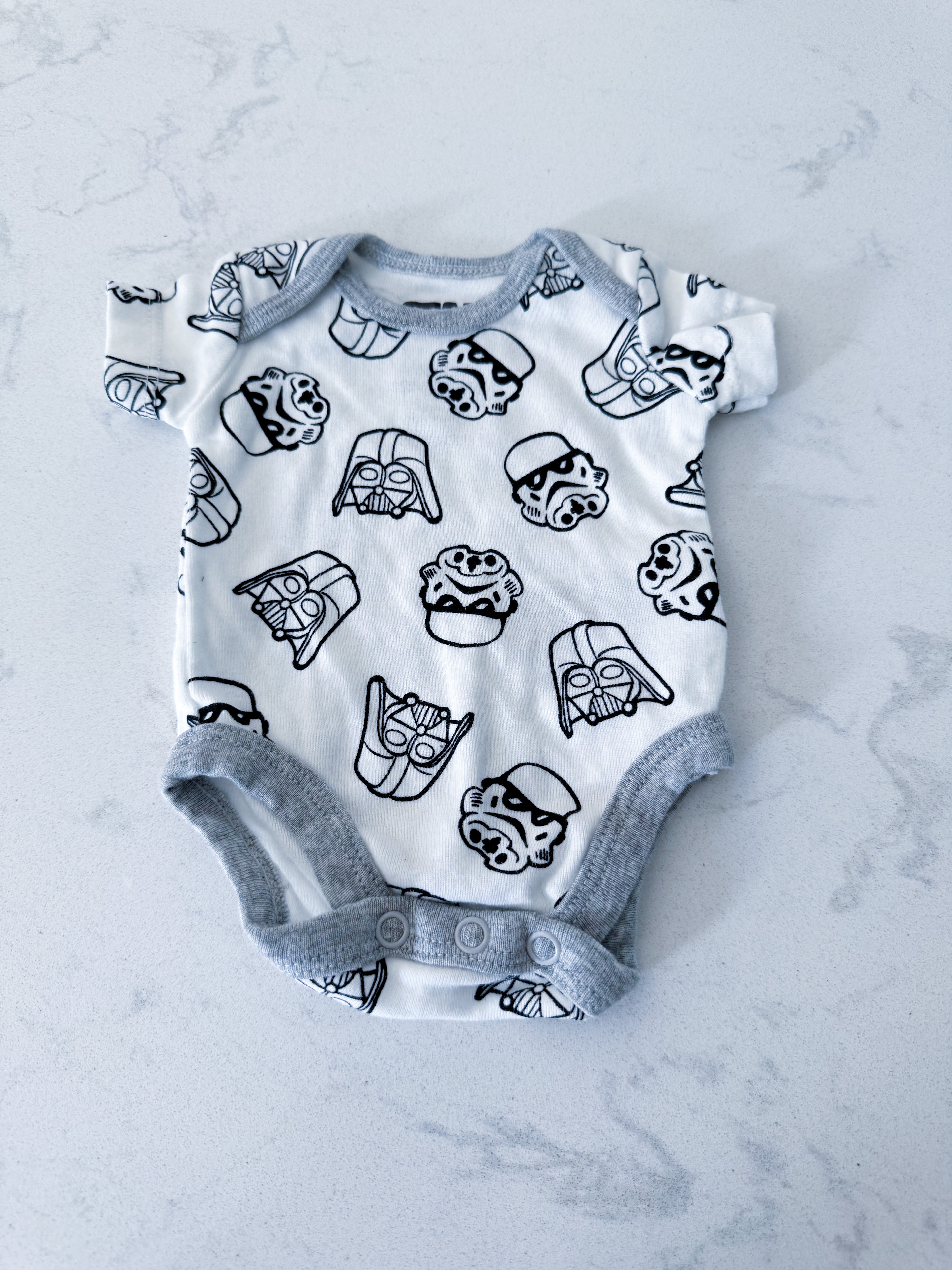 Amazon essentials- preemie- VGUC- white with grey trim short sleeve bodysuit and Star Wars graphics