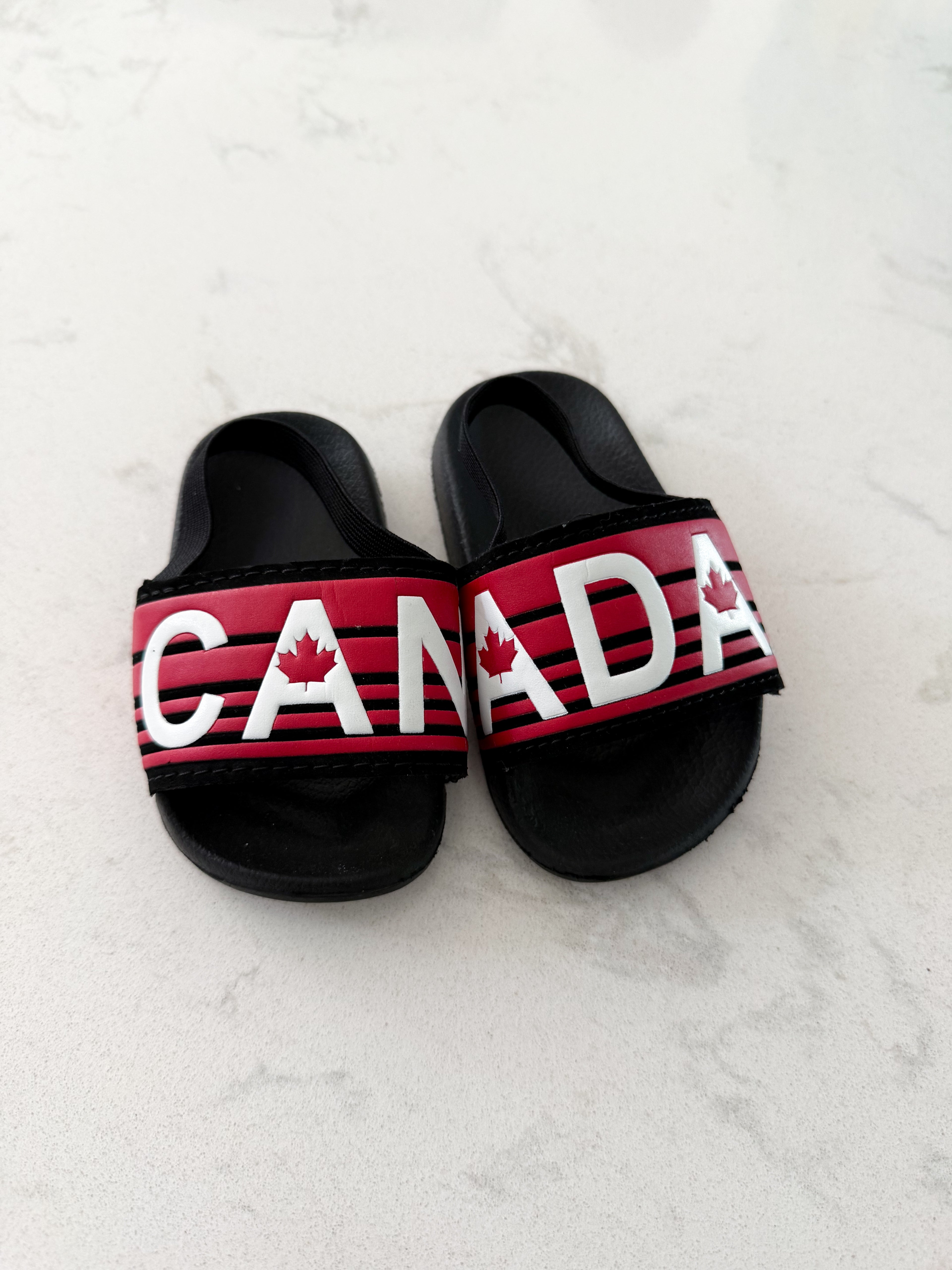 No brand- 3C- VGUC- black Canada Day slides