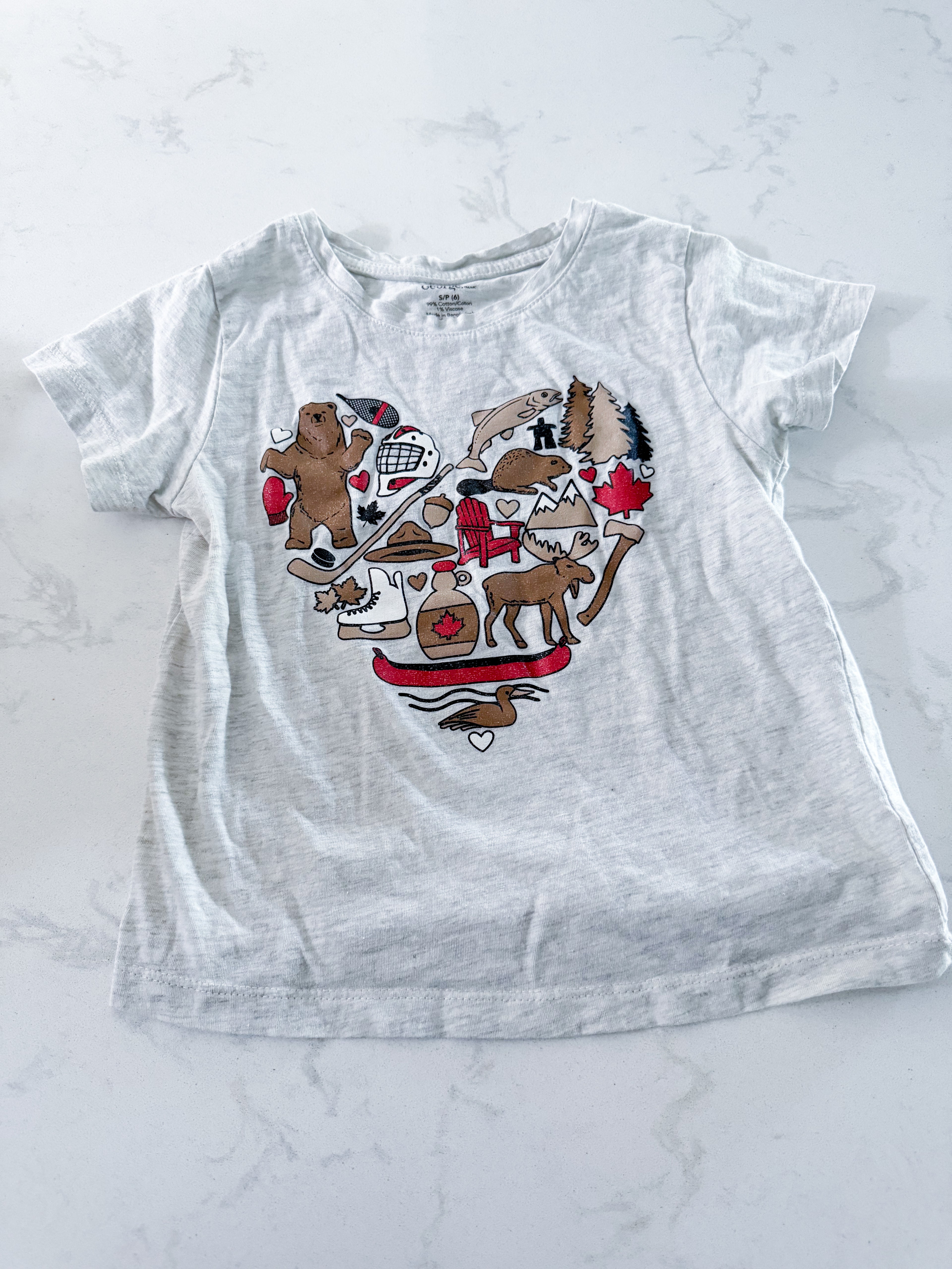 George- 6Y- VGUC- light grey t shirt with sparkly Canadian graphics in the shape of a heart