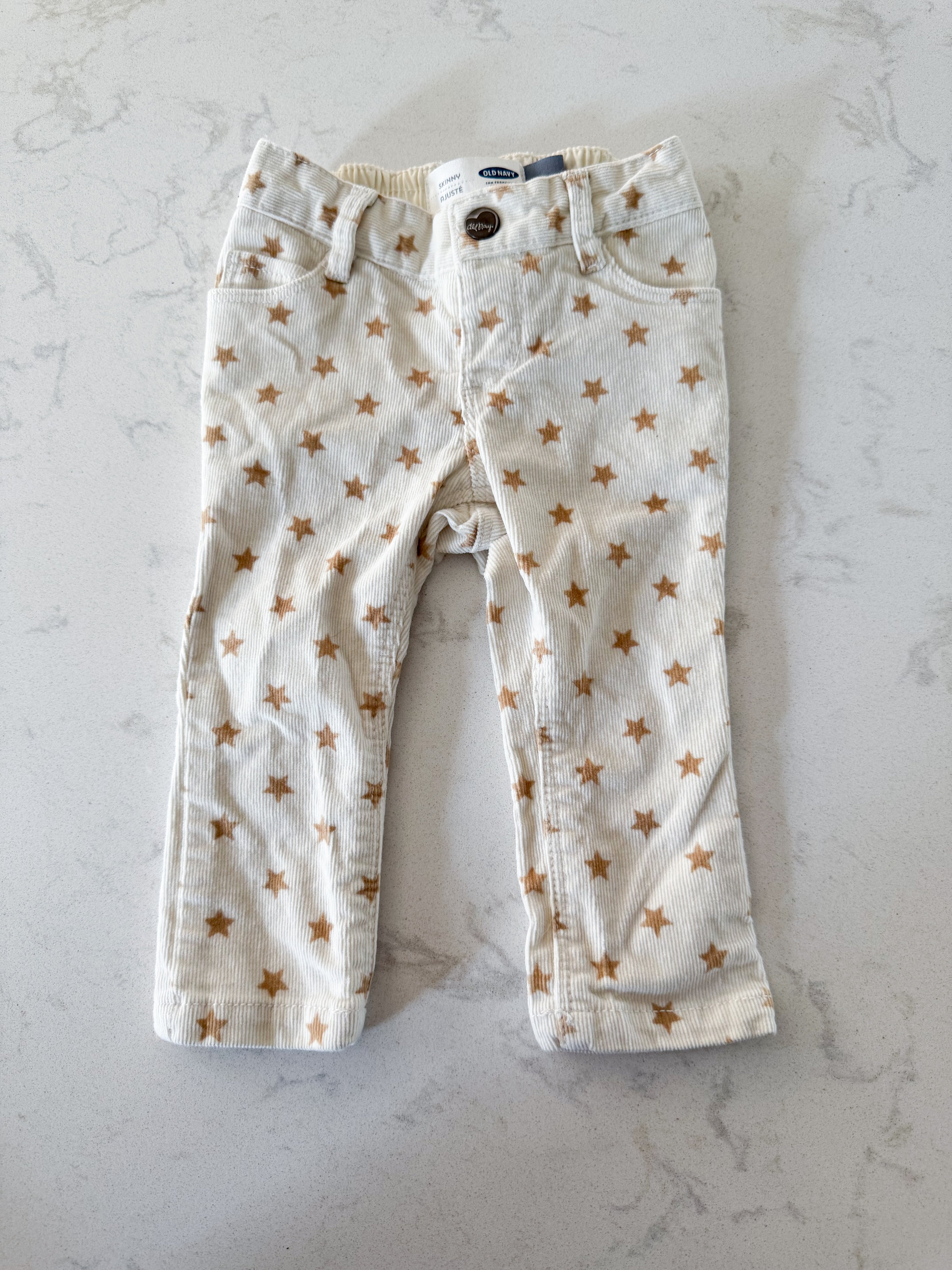 Old Navy- 12-18m- VGUC- cream coloured corduroy pants with brown stars