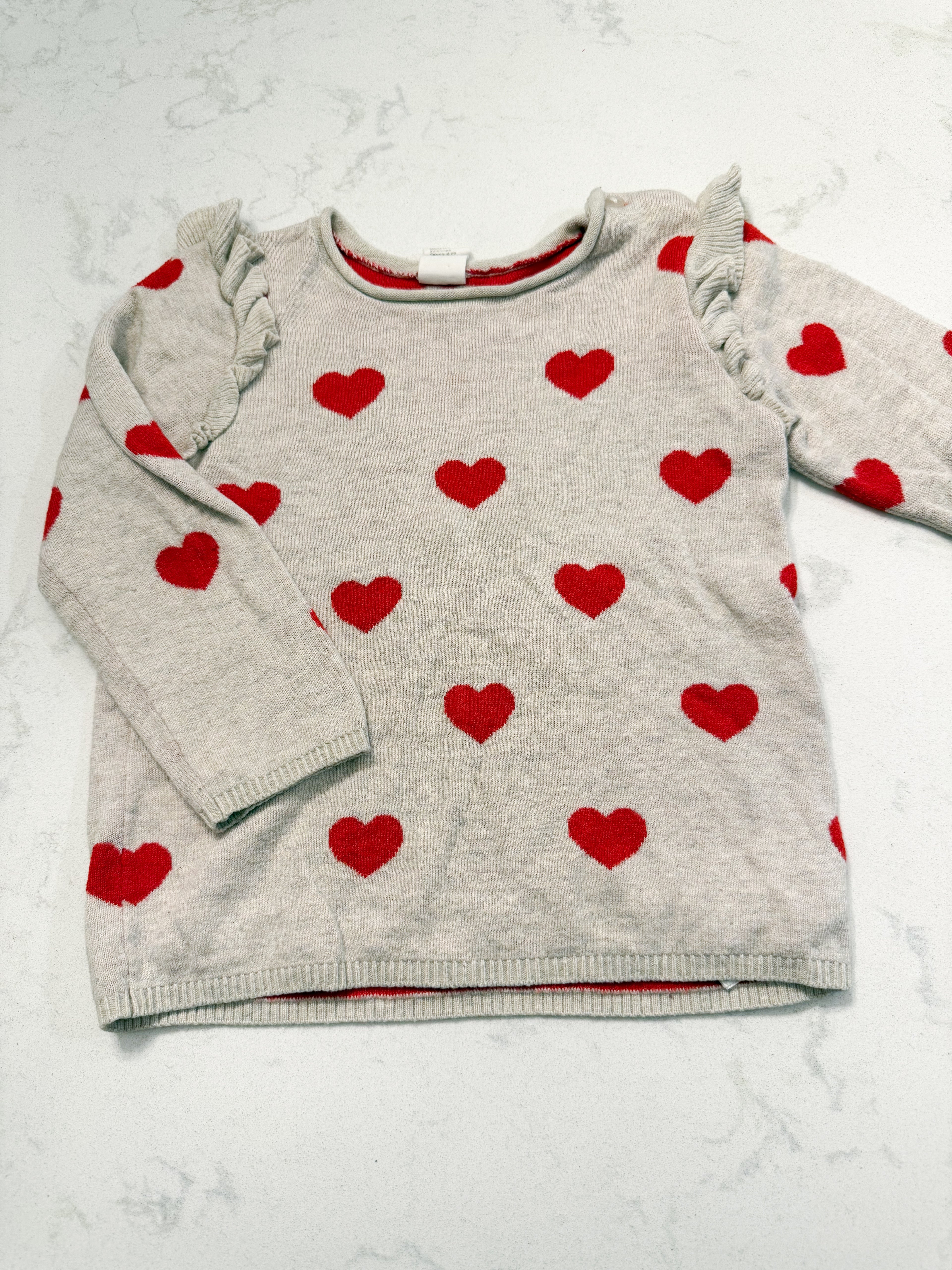 H&M- fits 18-24m- GUC- light beige knit sweater with ruffles and red hearts