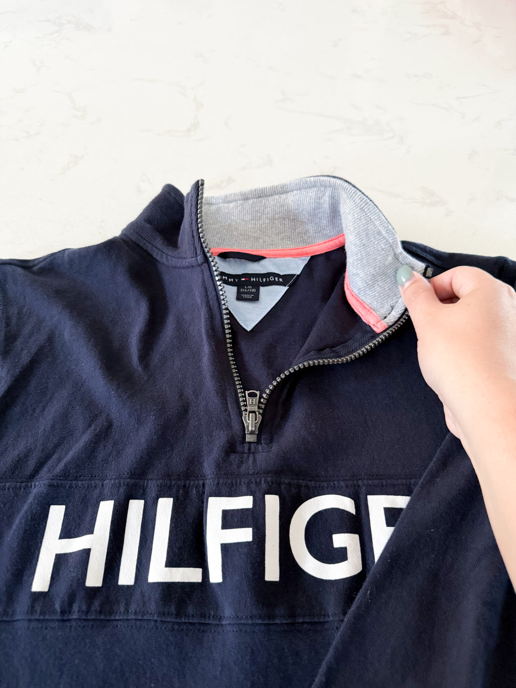 Tommy Hilfiger- 16-18Y- GUC- navy blue quarter zip with orange accents