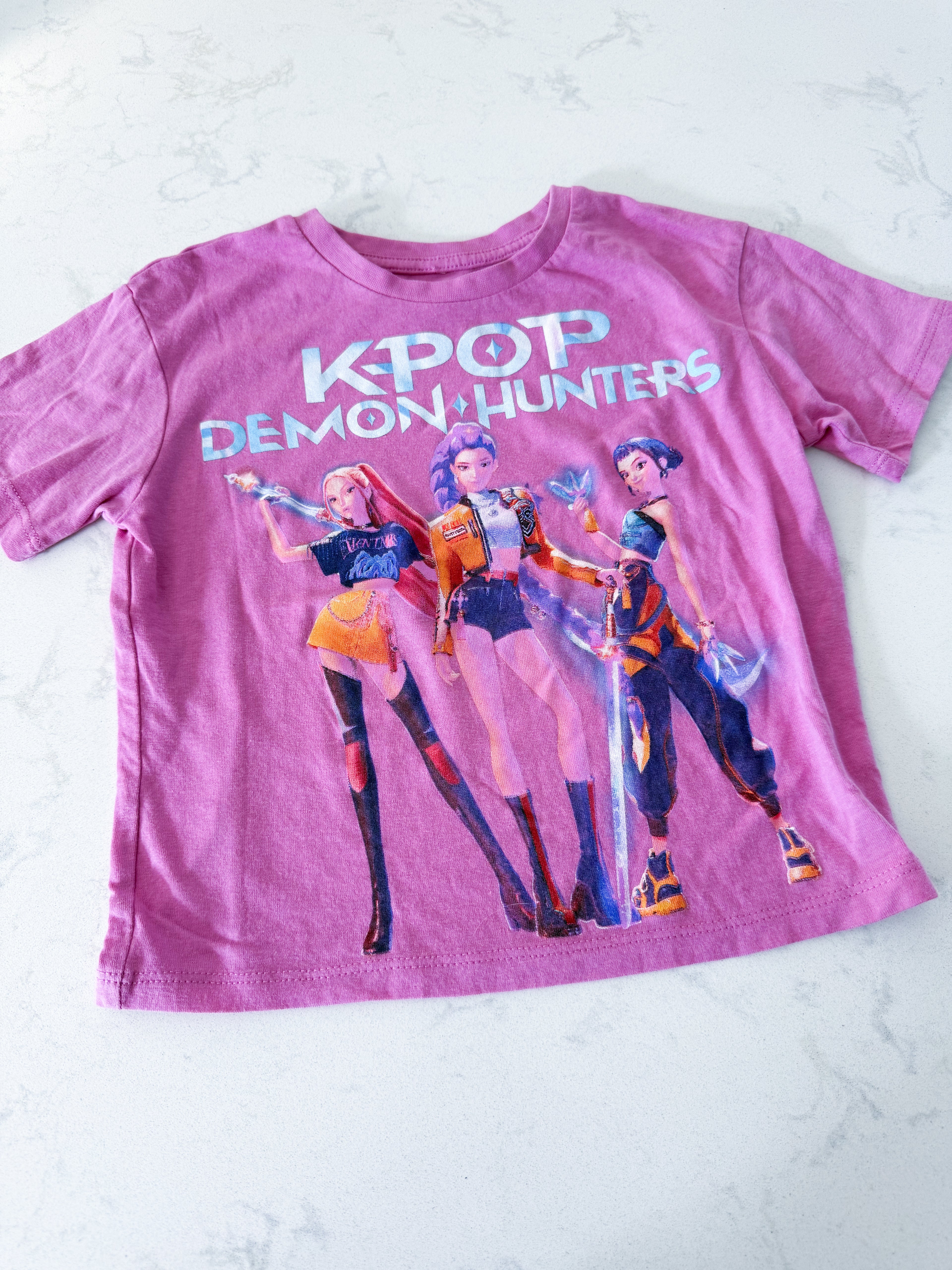 Netflix- 6/7Y- VGUC- pink short tee with K Pop Demon Hunter Graphics