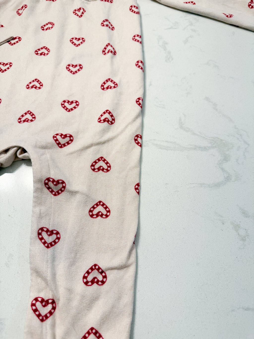 Joe Fresh- 18-24m- VGUC- light pink ruffle romper with candy cane hearts