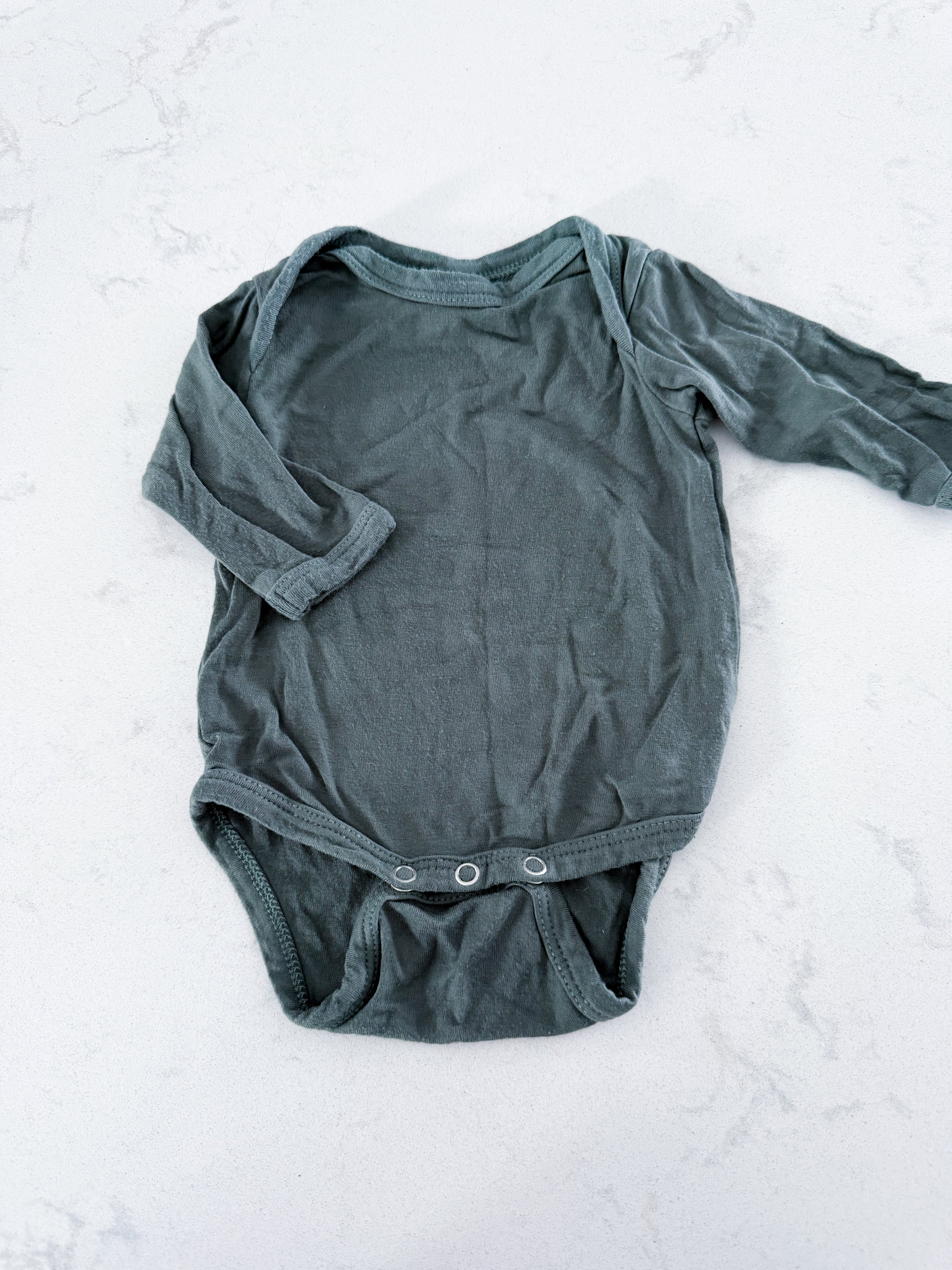 Kate Quinn- newborn- GUC- Forest green long sleeve bamboo bodysuit