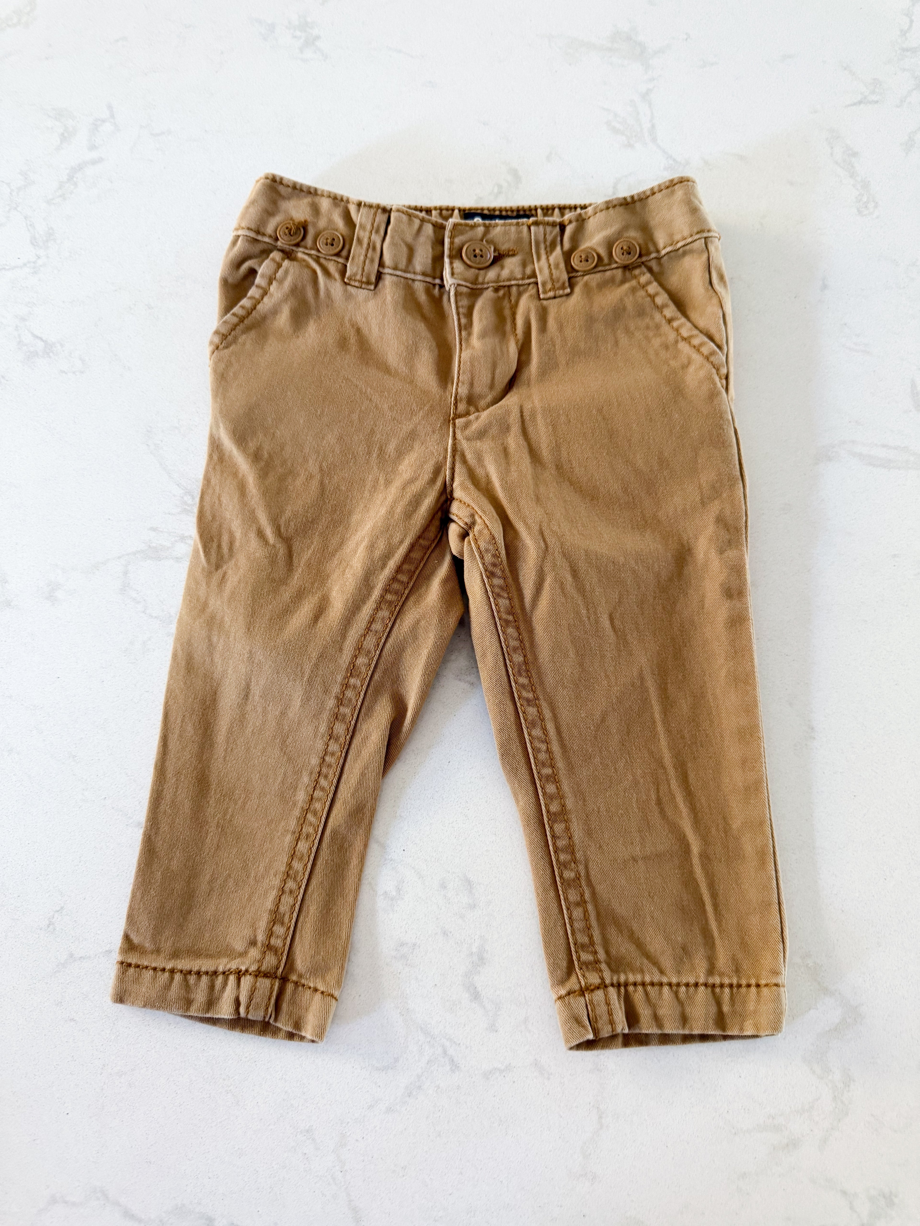 Oshkosh- 6-9m- GUC- beige khaki pants with buttons for suspender attachment