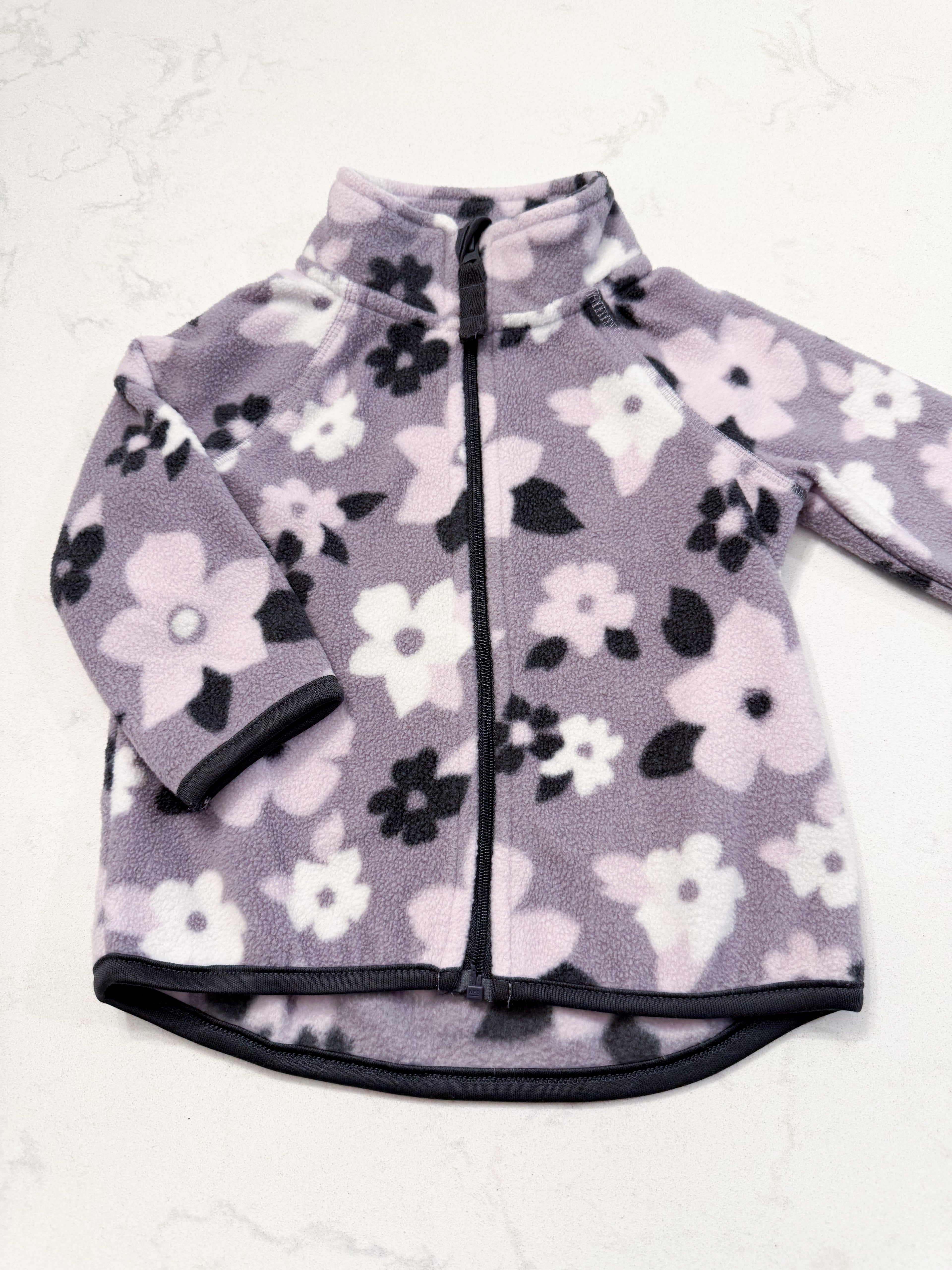 George- 6-12m- VGUC- light purple zip up with floral pattern