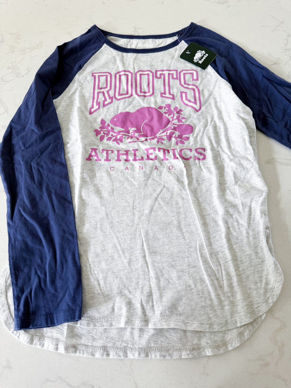 Roots- 9-10Y- BNWT- long sleeve shirt with blue sleeves and pink logo