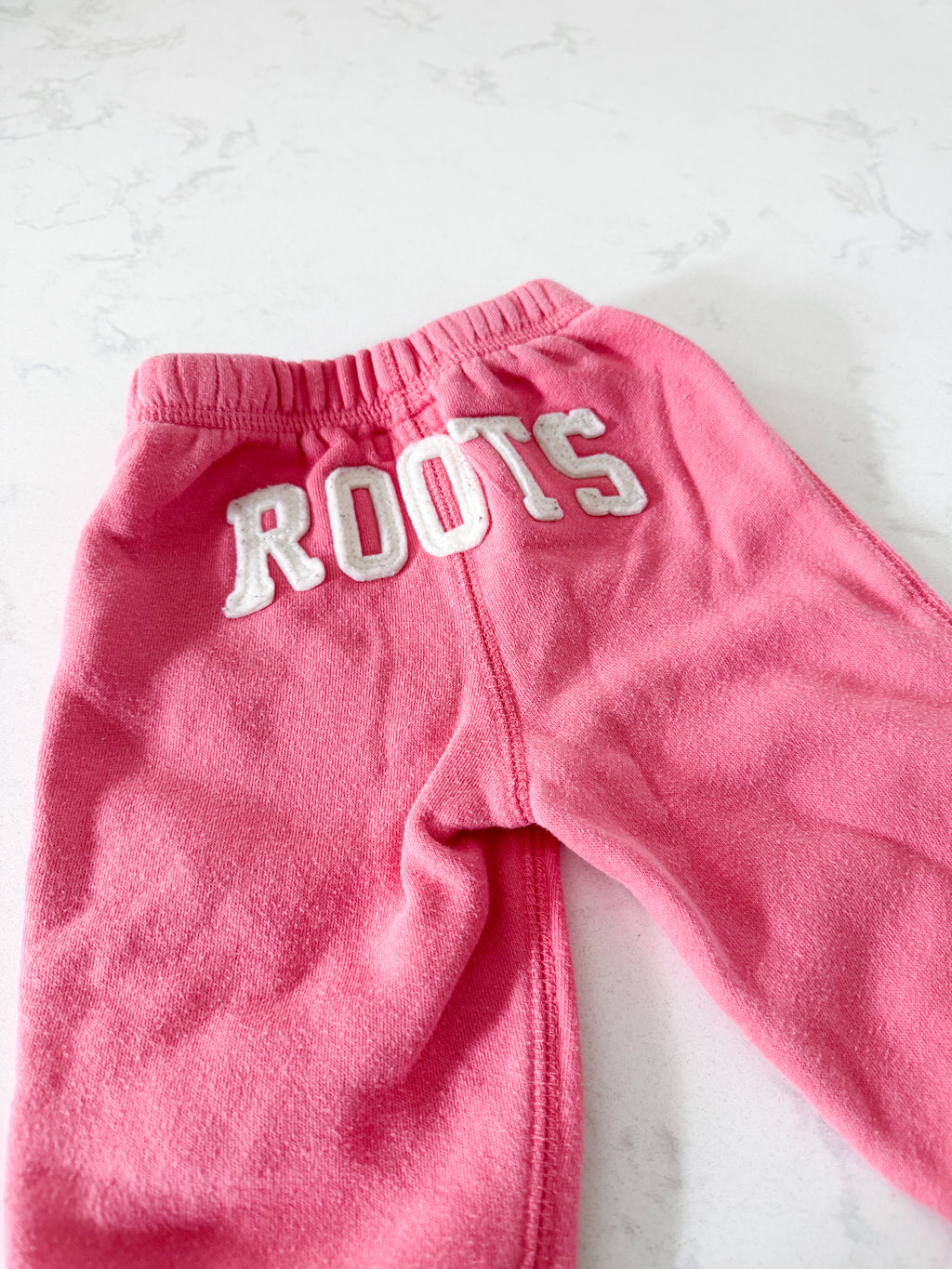 Roots- 6-12m- PLAY- bubblegum pink sweat pants with symbol