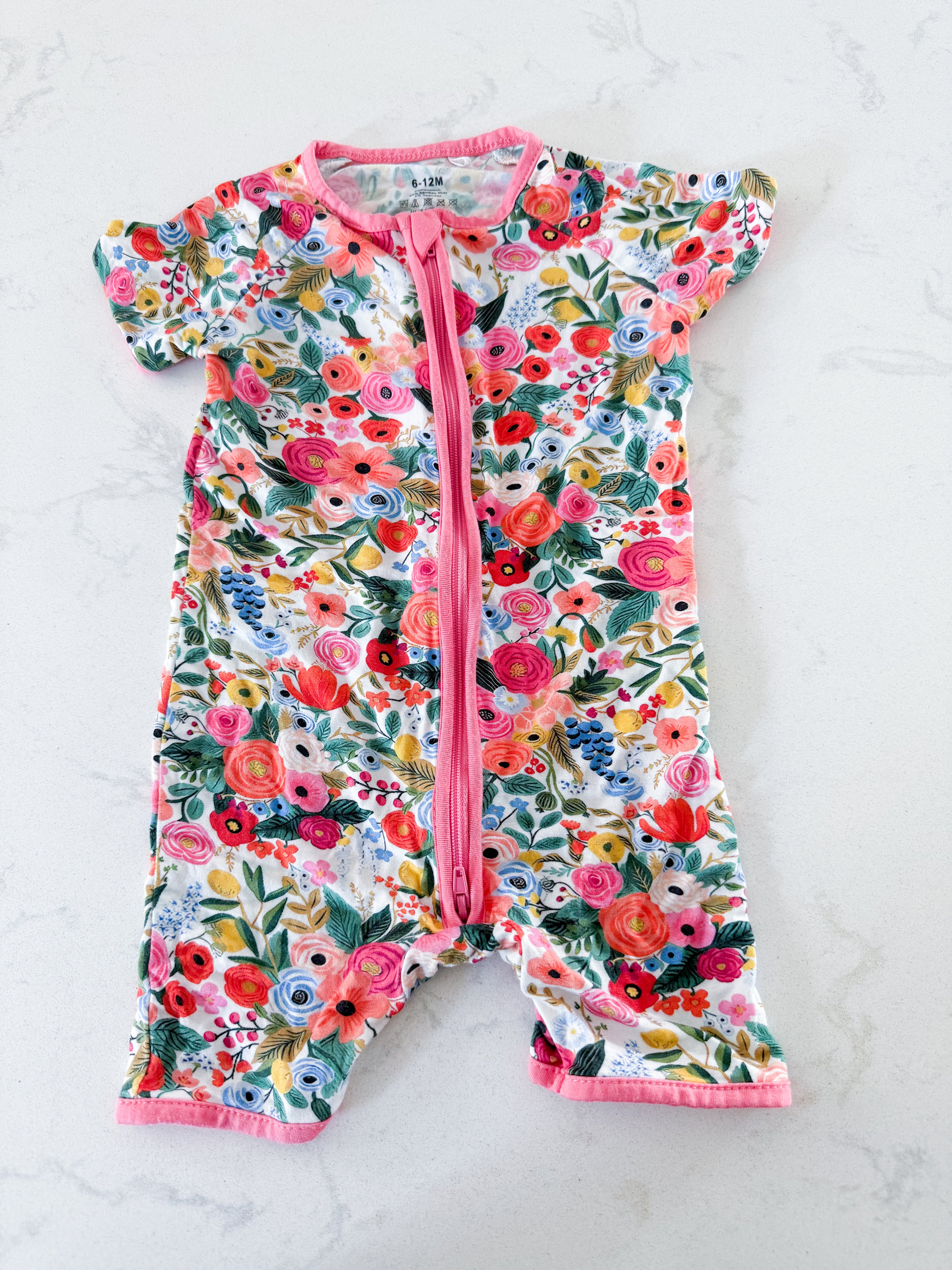 No brand- 6-12m- VGUC- shortie jammies with bright floral pattern