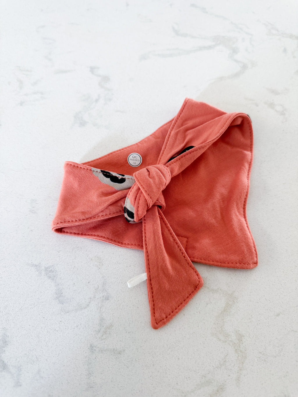 Kyte Baby- One size- VGUC- orange tie up drool bib (not towel lined)