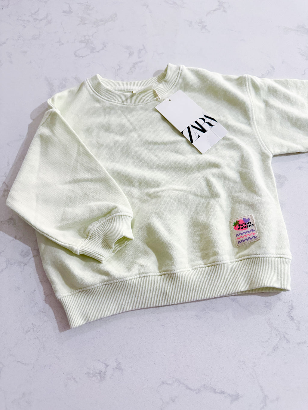 Zara- fits 2T- BNWT- bright light green crewneck with sunny moments patch