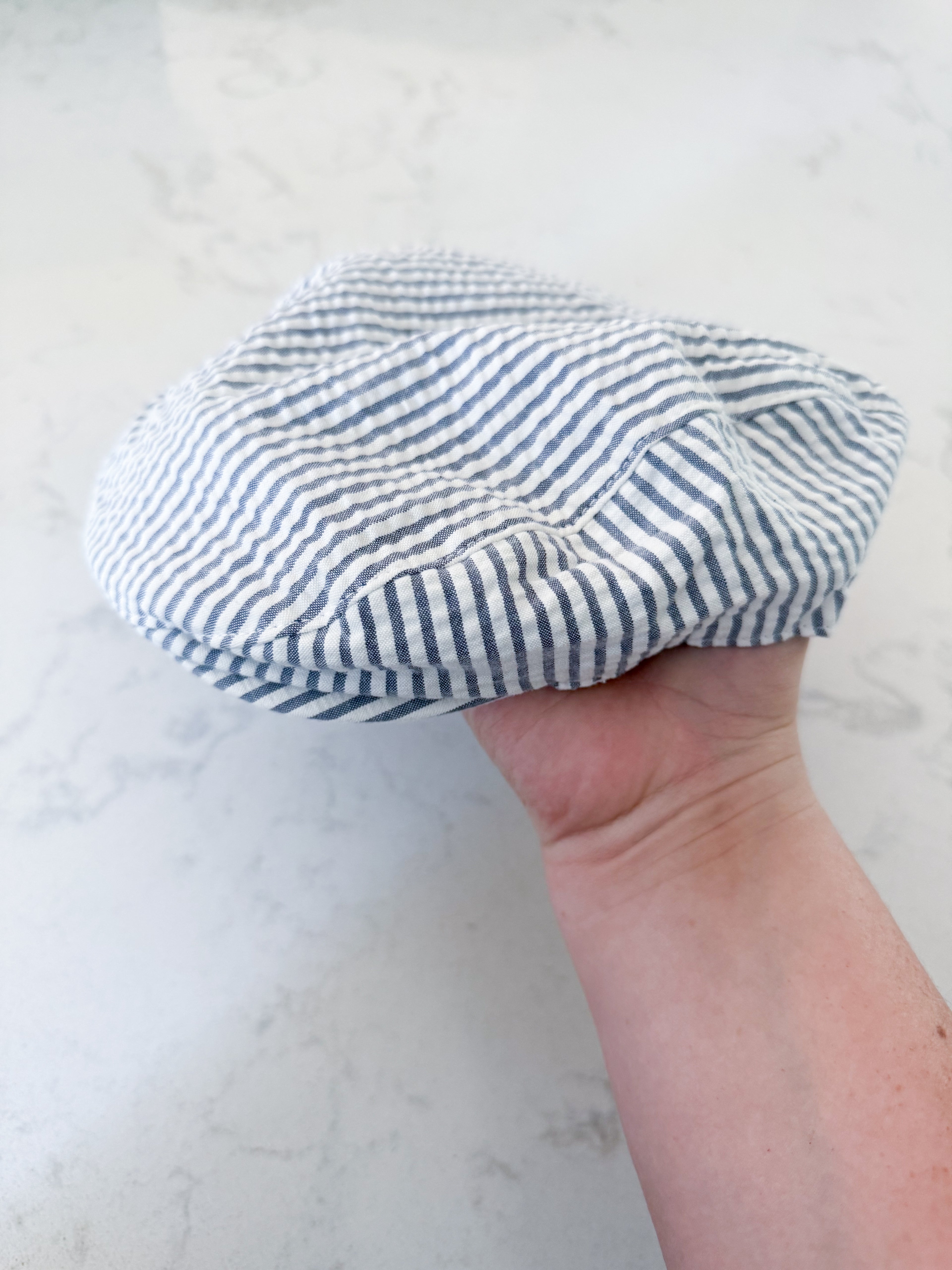 Crazy 8- 12-24m- VGUC- white and light blue striped muffin hat