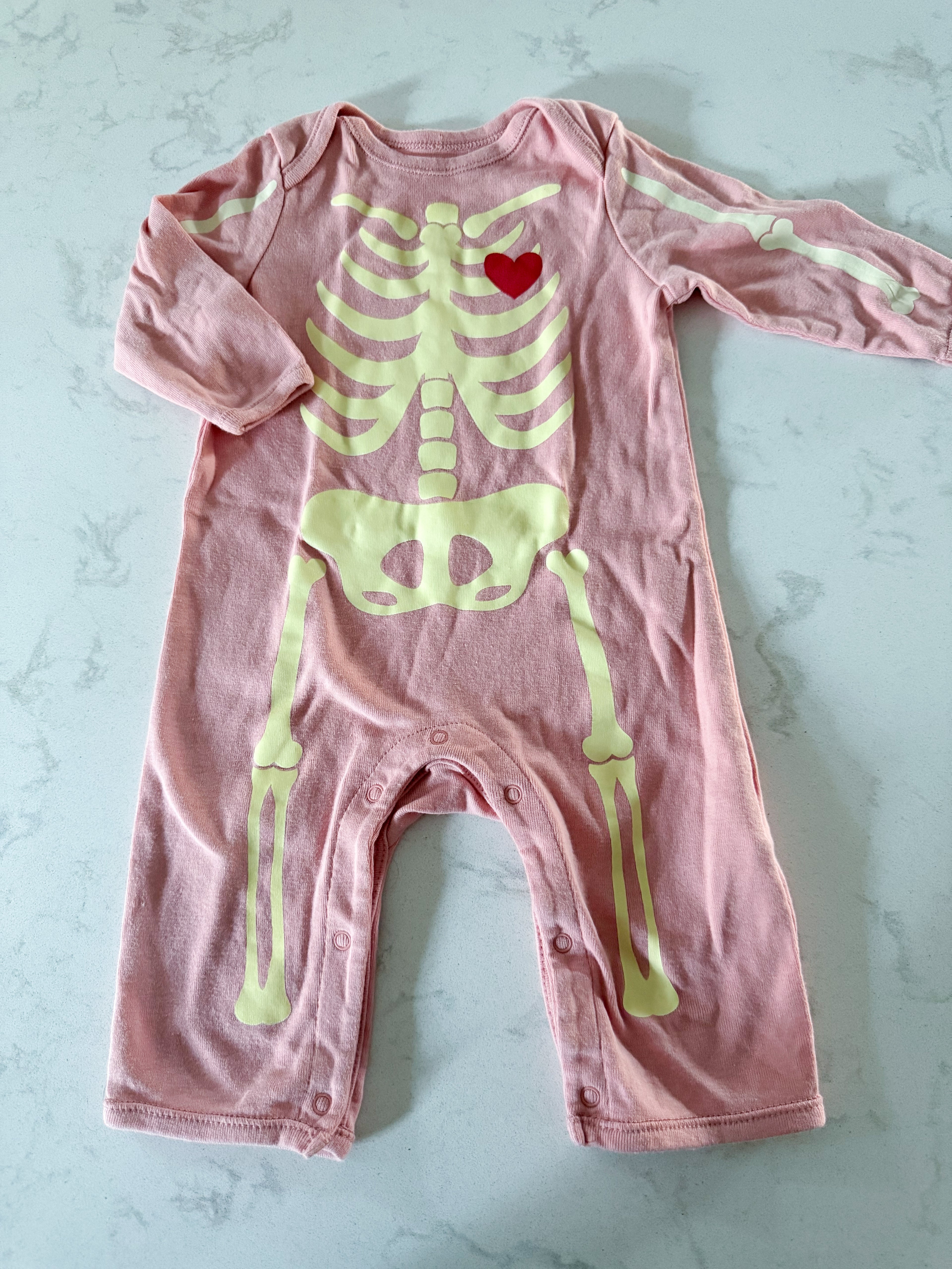 Old Navy- 3-6m- GUC- pink footless skeleton romper