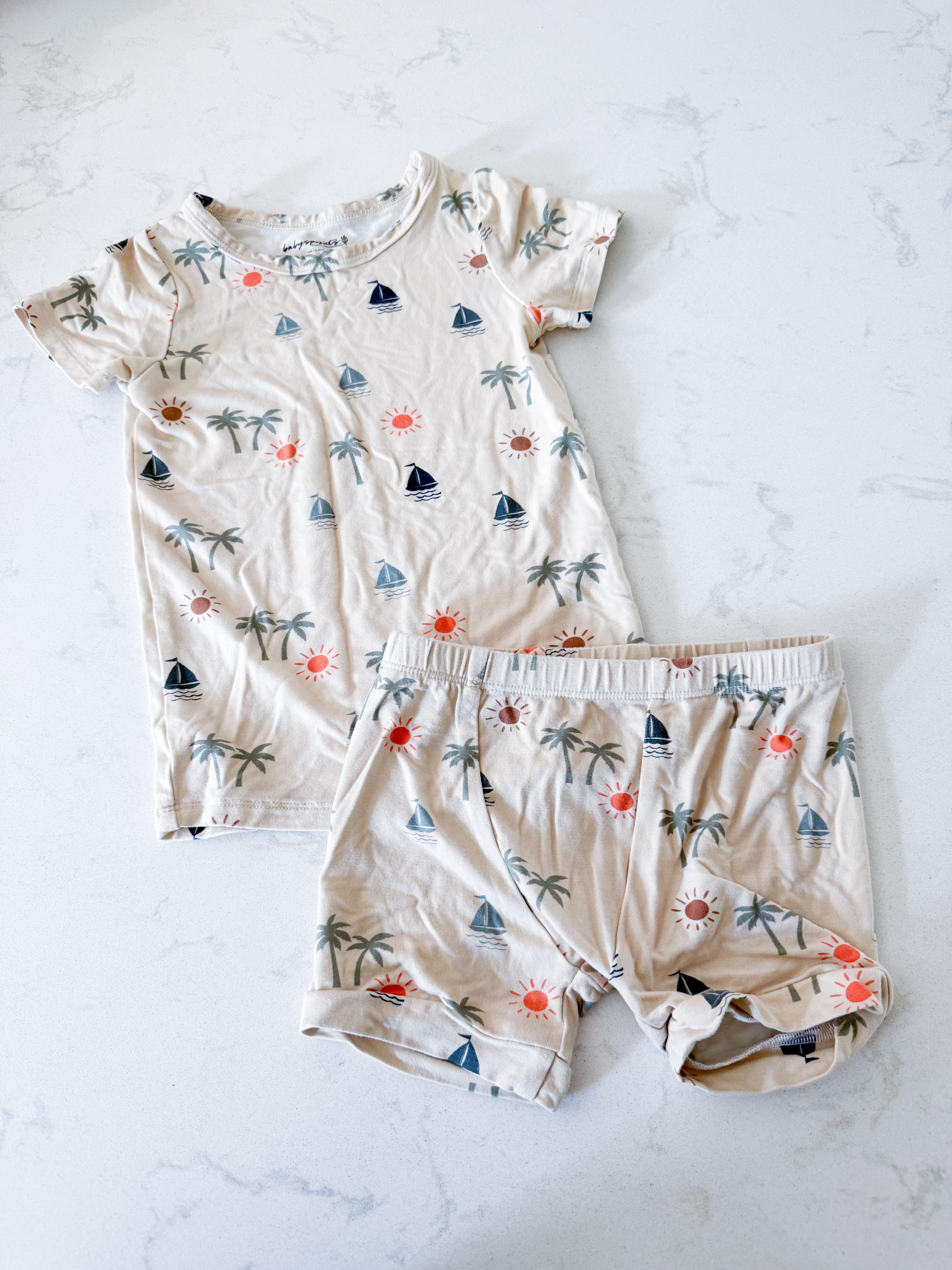 Baby Sprouts- 18-24m- VGUC- cream two piece bamboo shorts jammies with tropical sailboat pattern