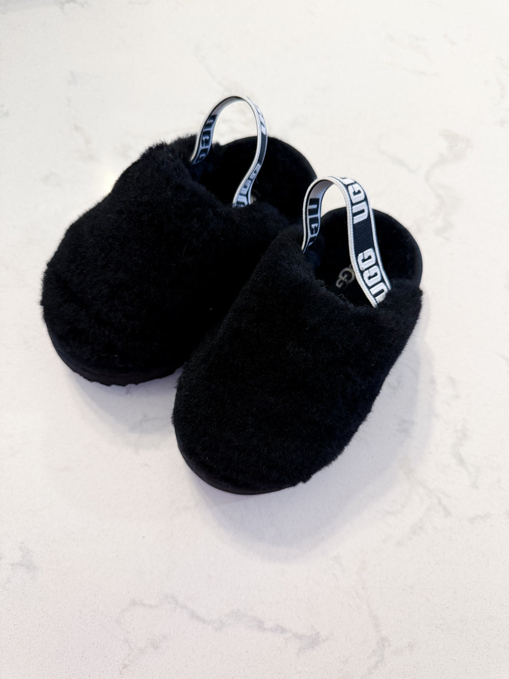 Uggs- 6C- BNWT- black fur slip on clogs with strap