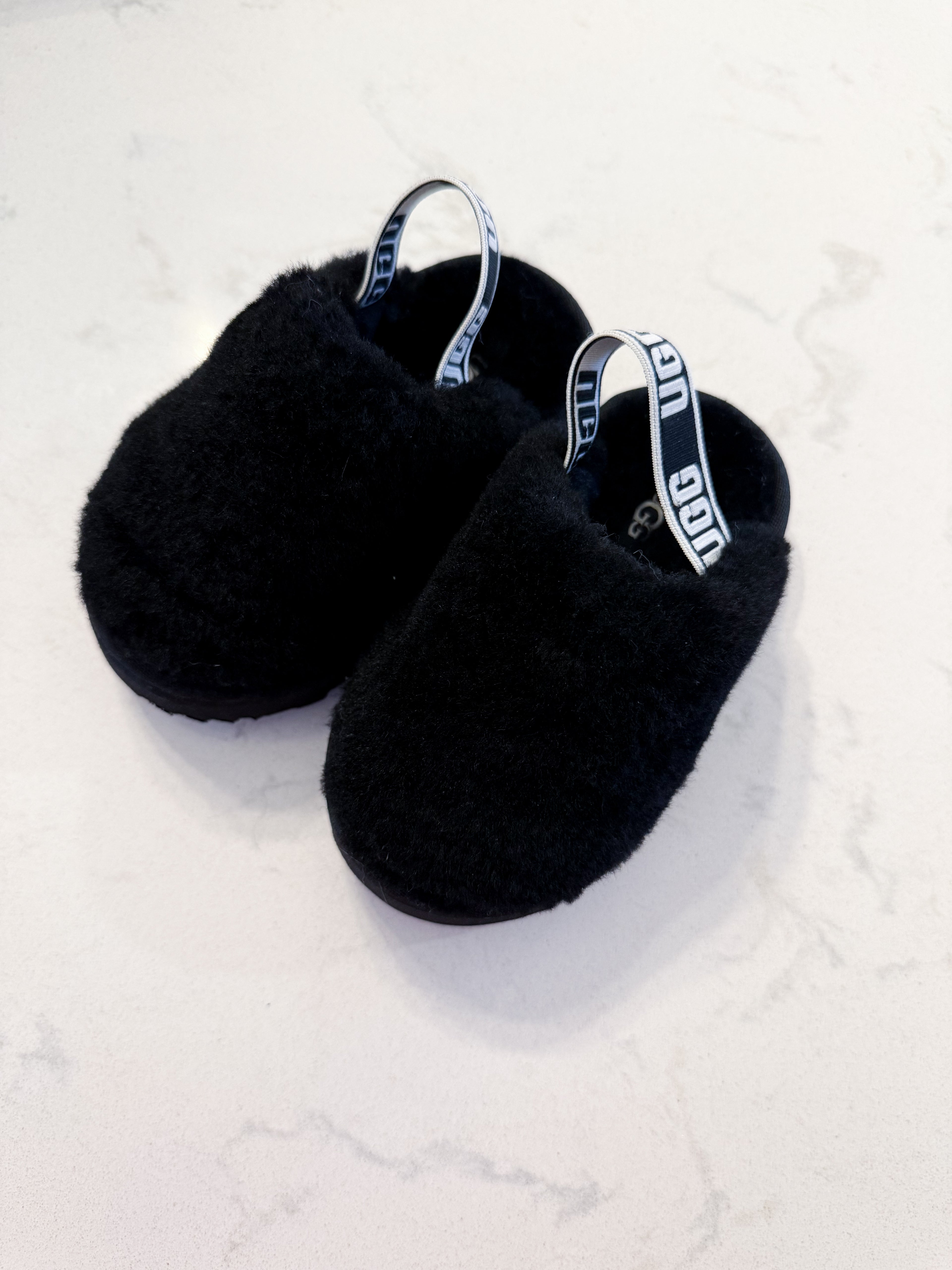 Uggs- 6C- BNWT- black fur slip on clogs with strap