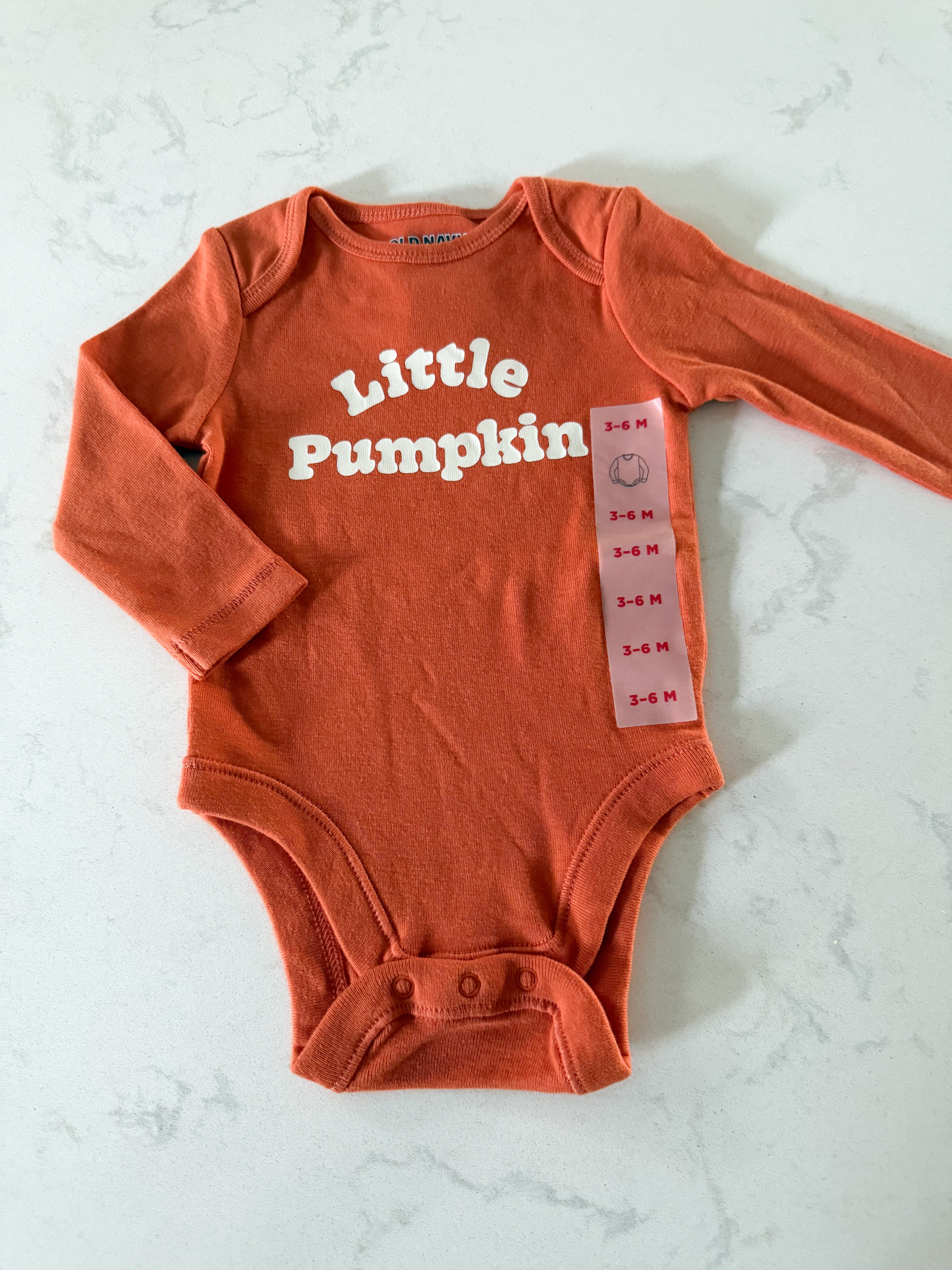 Old Navy- 3-6m- BNWT- long sleeve orange bodysuit with “little pumpkin”