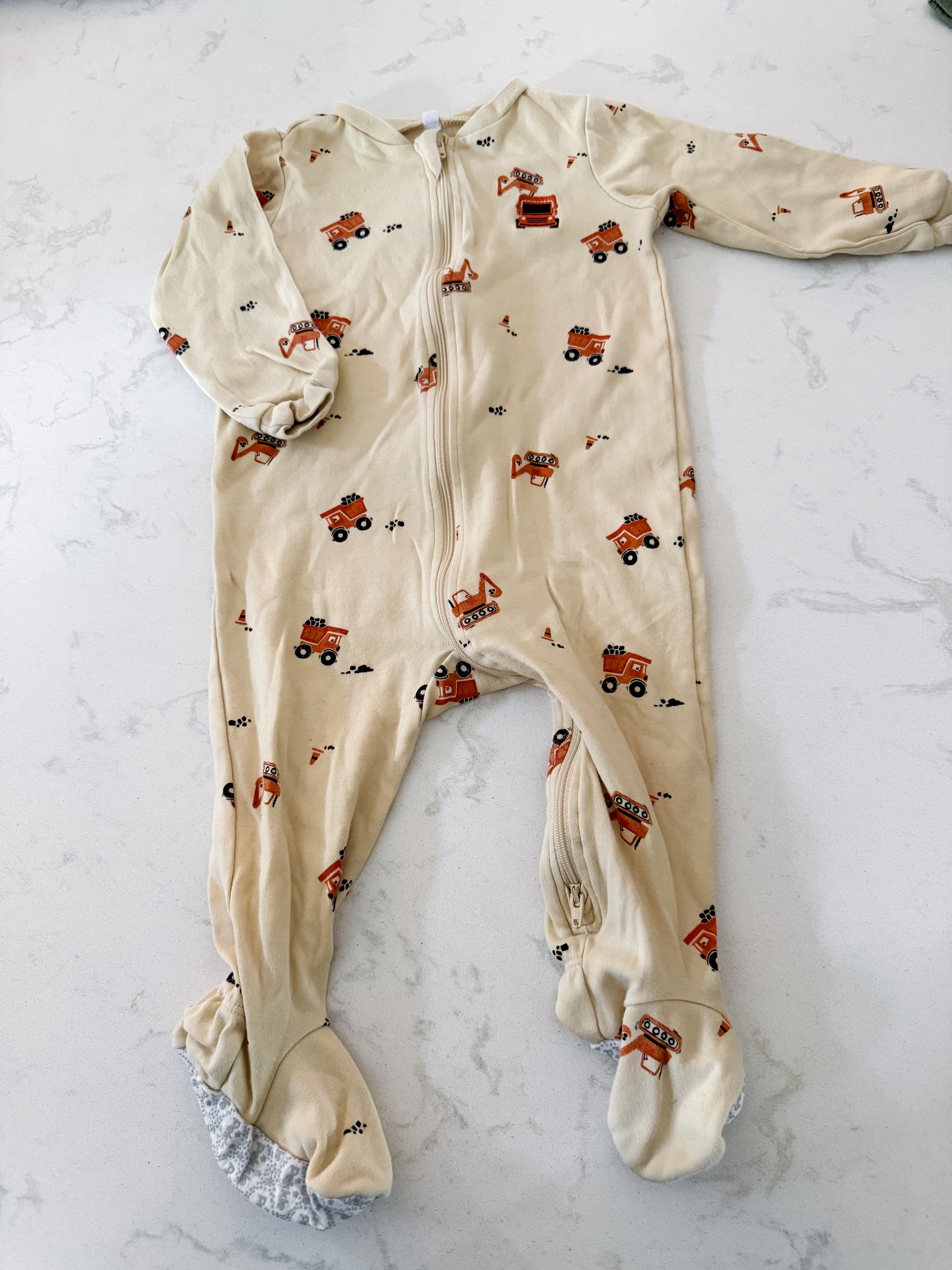Pekkle- 18m- GUC- creamy yellow zip up footie Jammies with embroidered construction truck