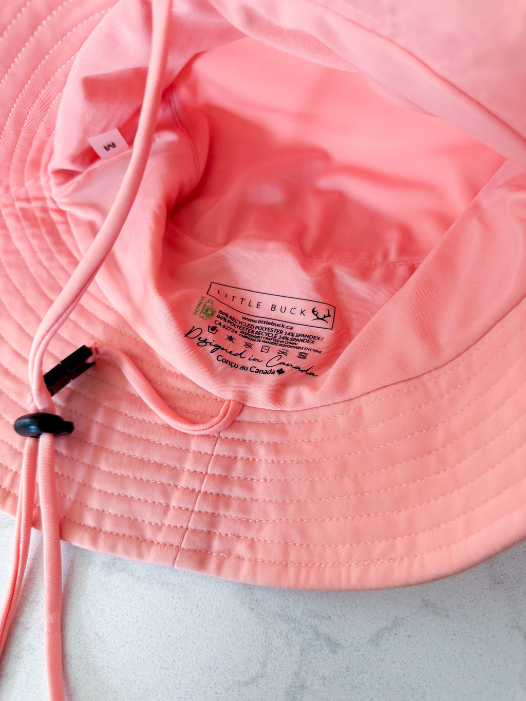 Little Buck- medium (18m-3Y)- VGUC- light orange swim hat with strap