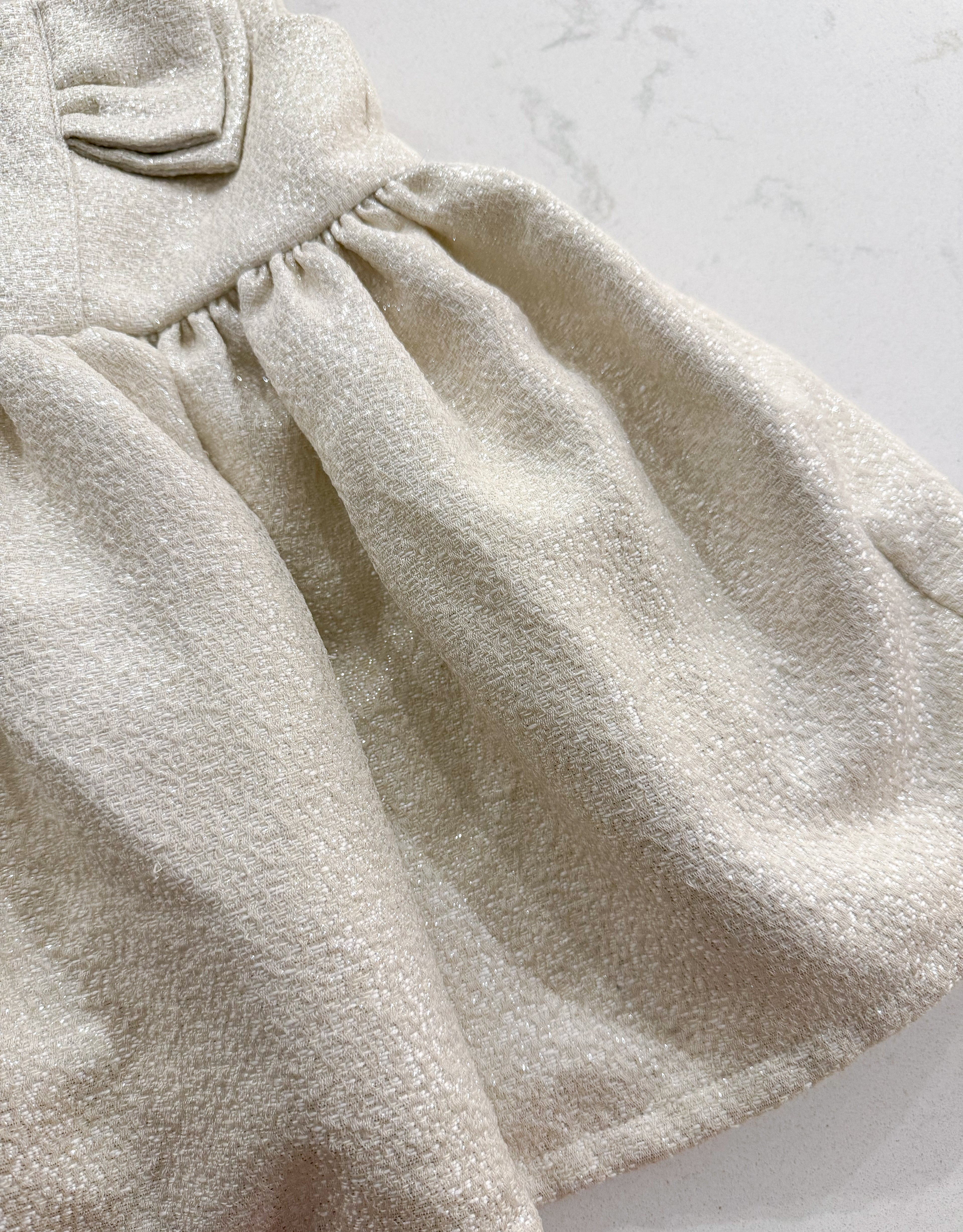 Carter’s- 12m- VGUC- white and gold sparkle dress with bow on chest