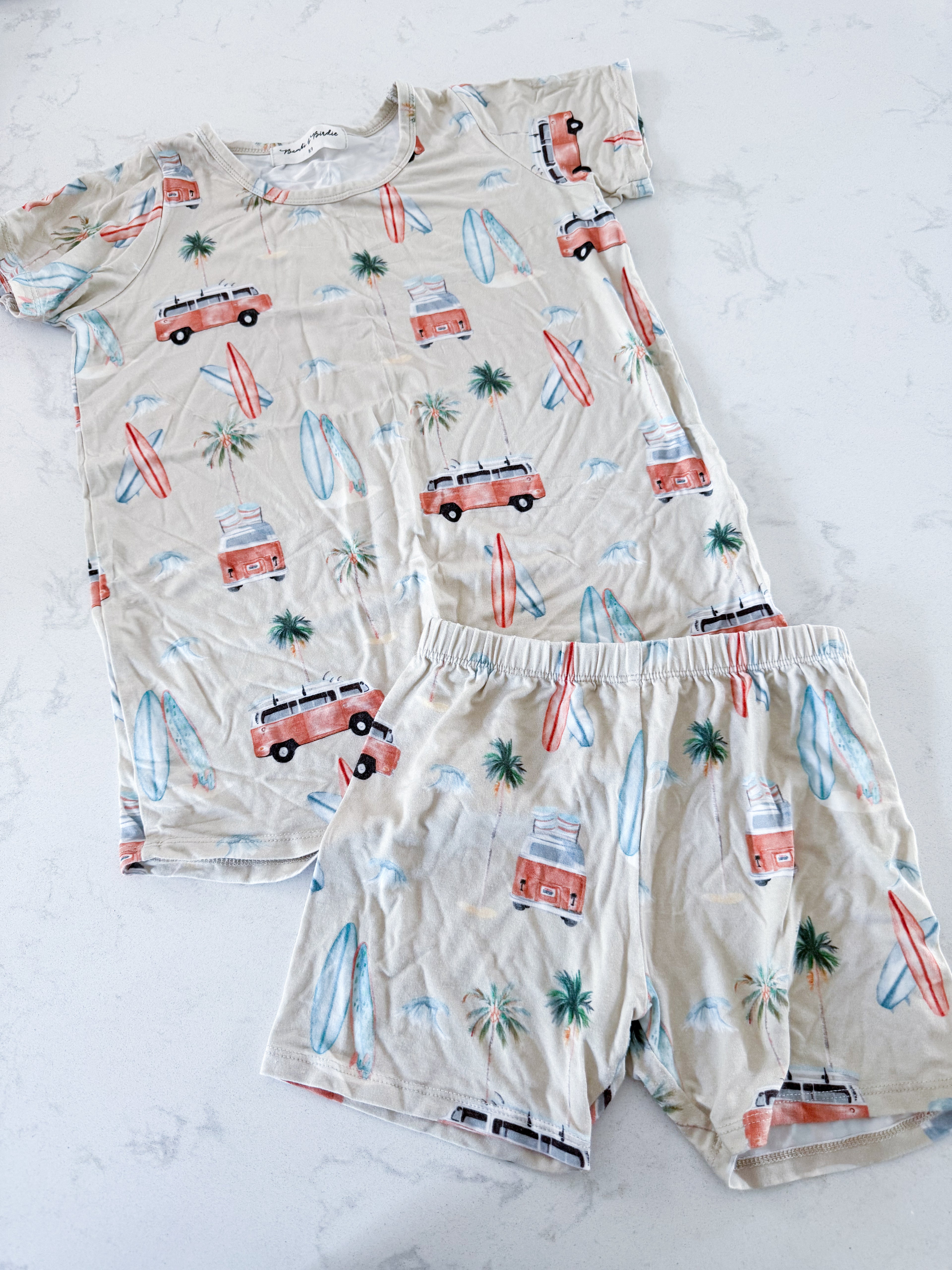 Bambi and Birdie- 8/9Y- VGUC- beige two piece bamboo shorts jammies with surfing graphics