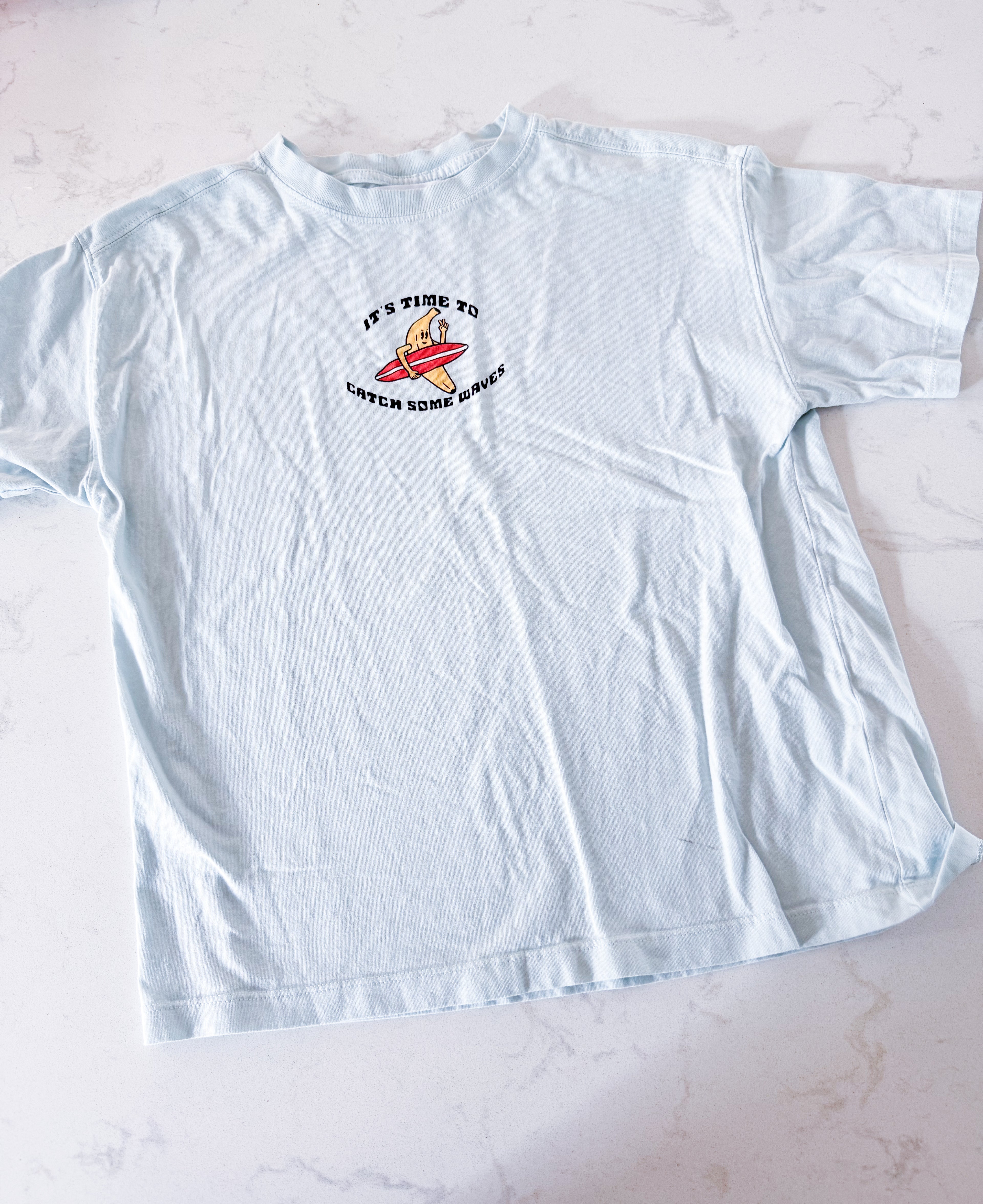 Zara- 9-10Y- PLAY- ice blue t shirt with banana surfing graphic
