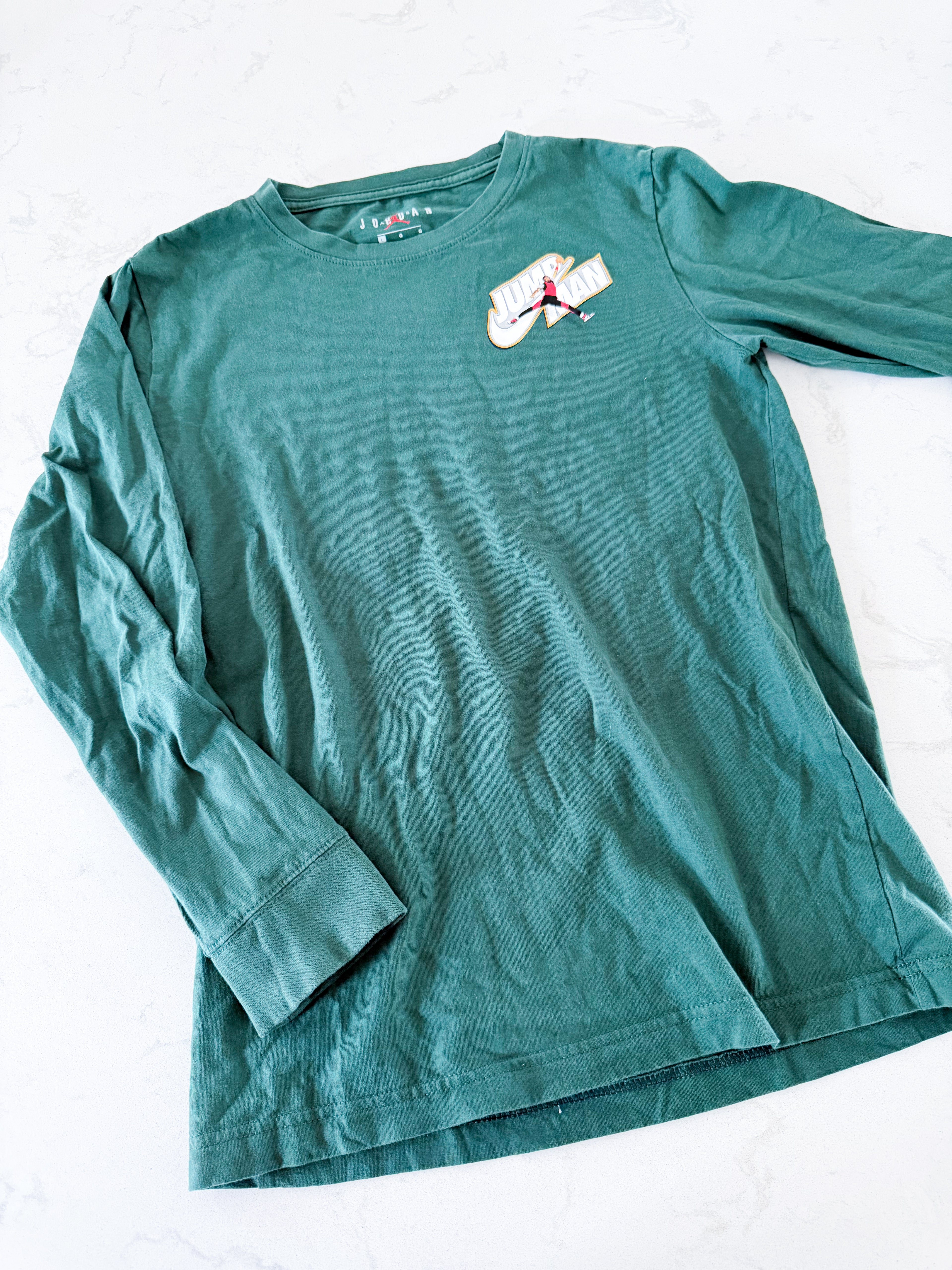 Air Jordan- 12-13Y- PLAY- Forest green long sleeve shirt with jump man Air Jordan logo on back and front