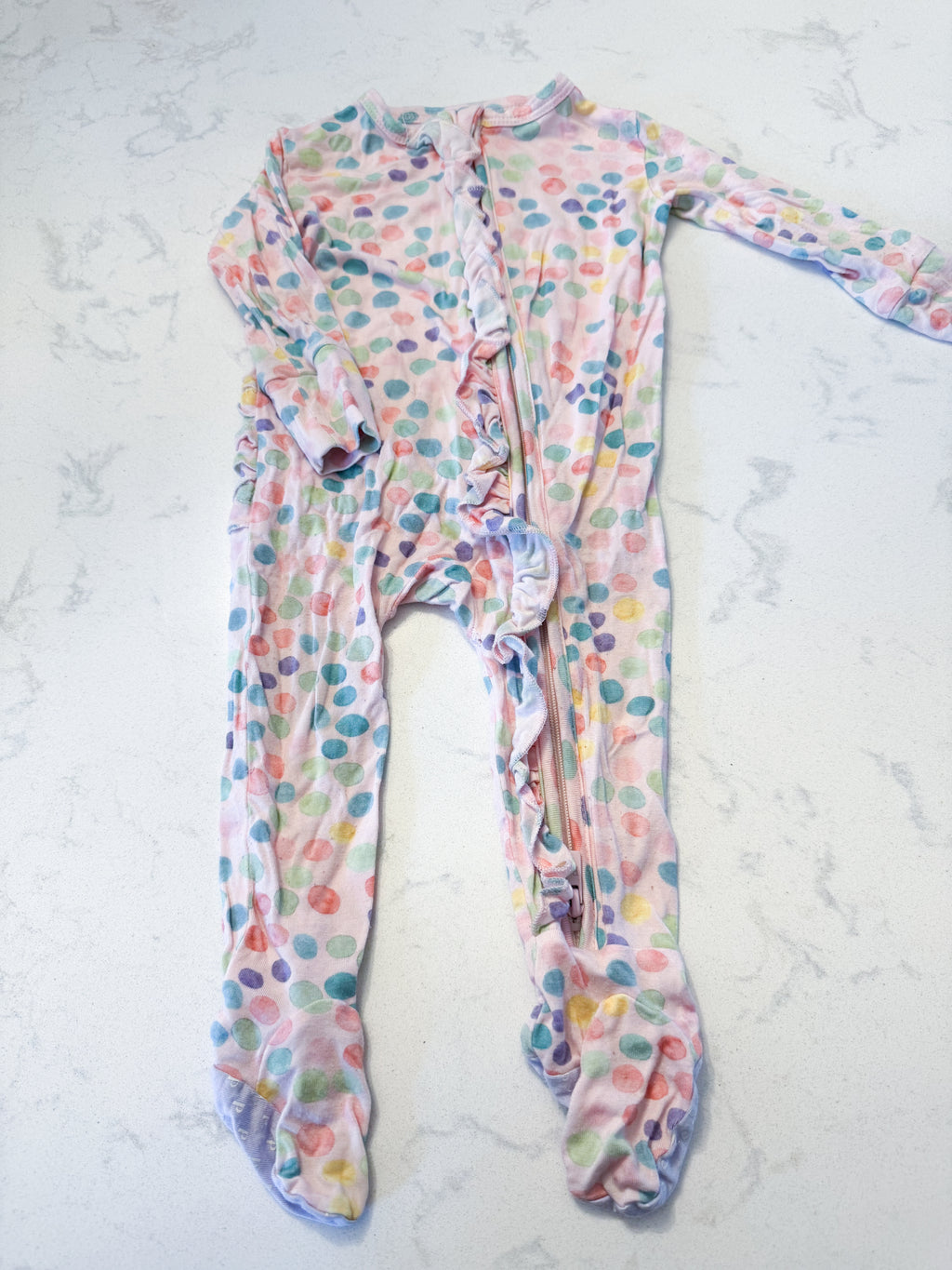 Posh Peanut- 3-6m- GUC- light pink bamboo footie pajamas with ruffle bum and zipper