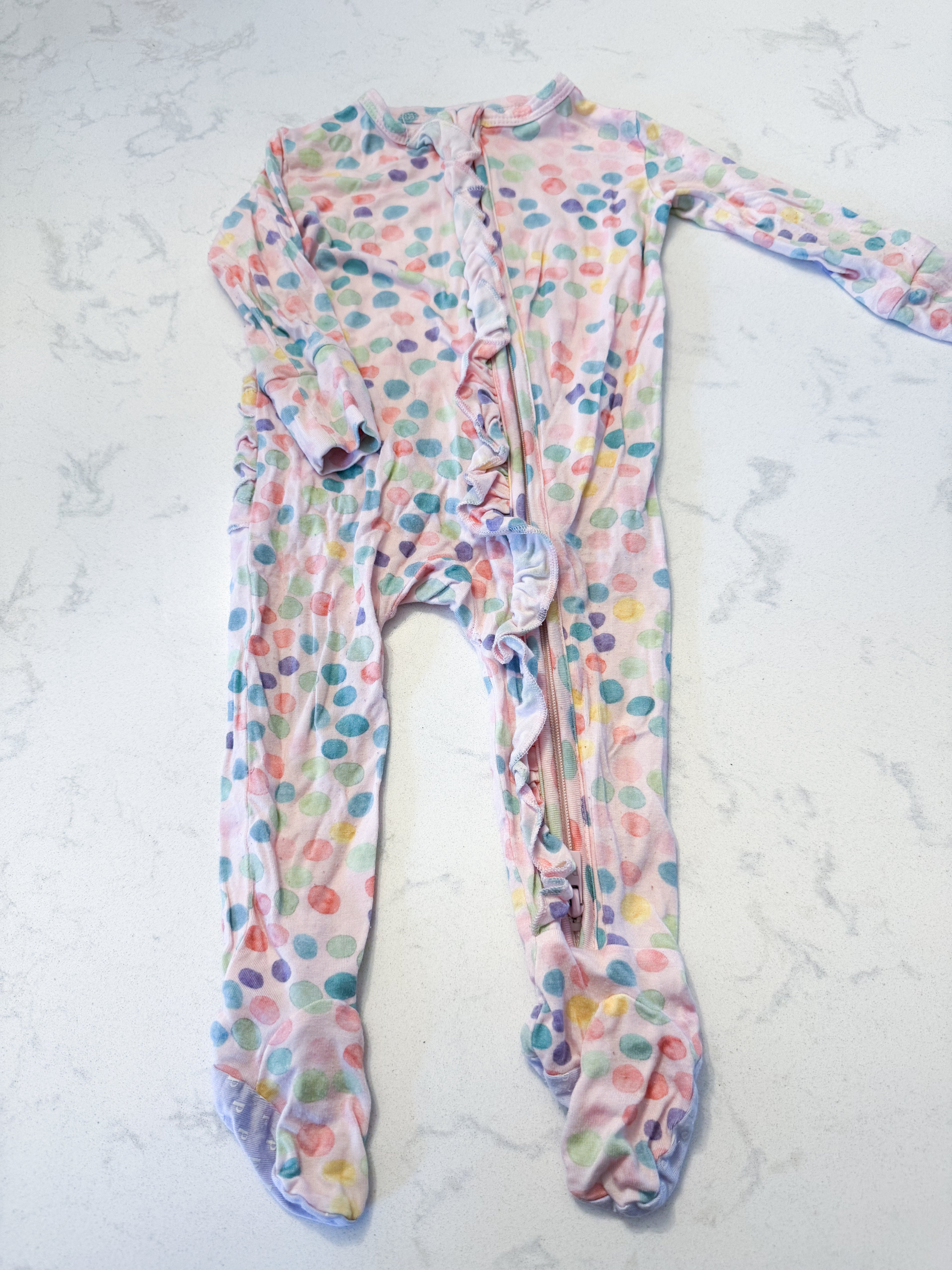 Posh Peanut- 3-6m- GUC- light pink bamboo footie pajamas with ruffle bum and zipper