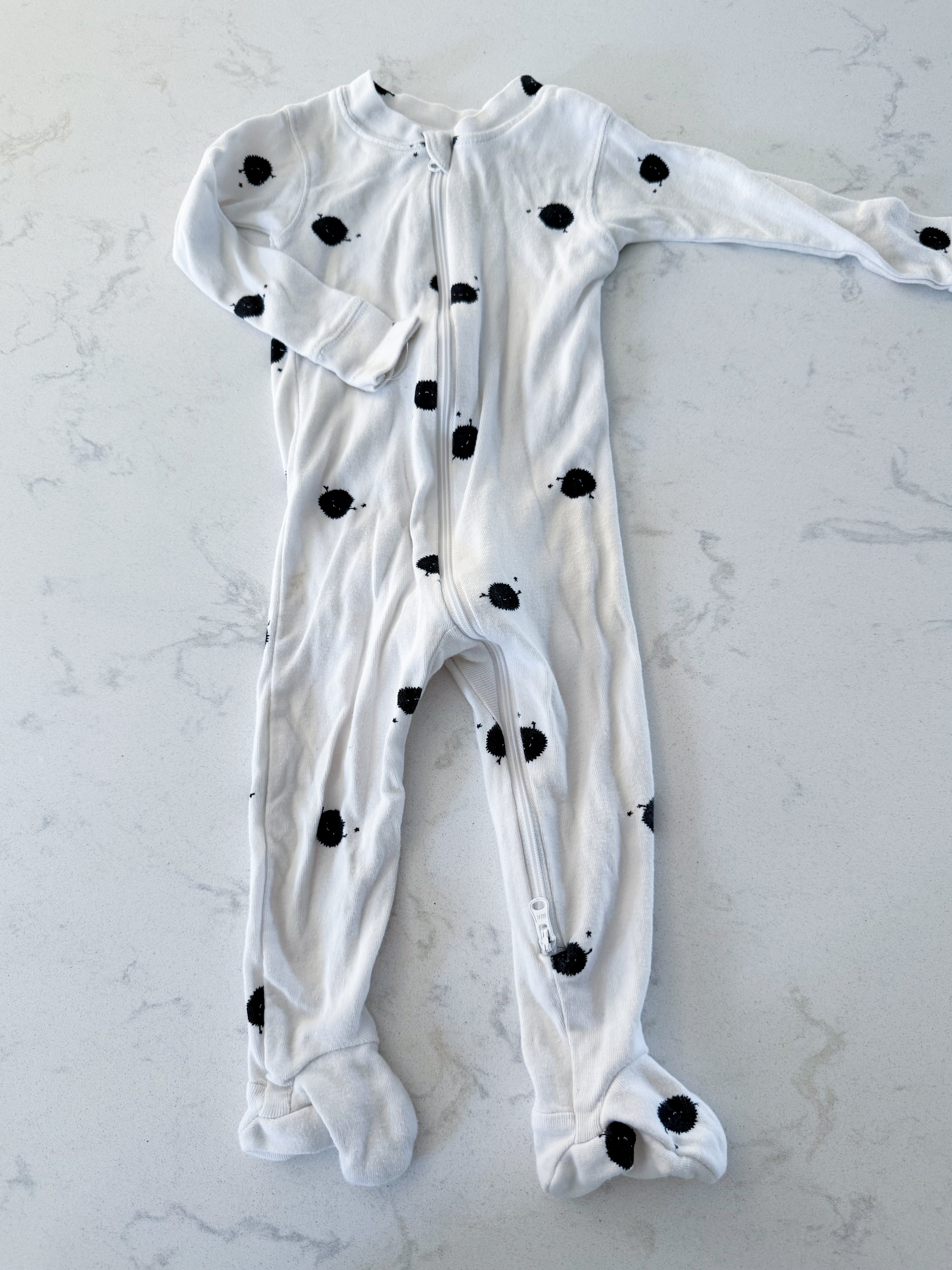 Rise Little Earthling- 9-12m- GUC- white footie jammies with RLE characters