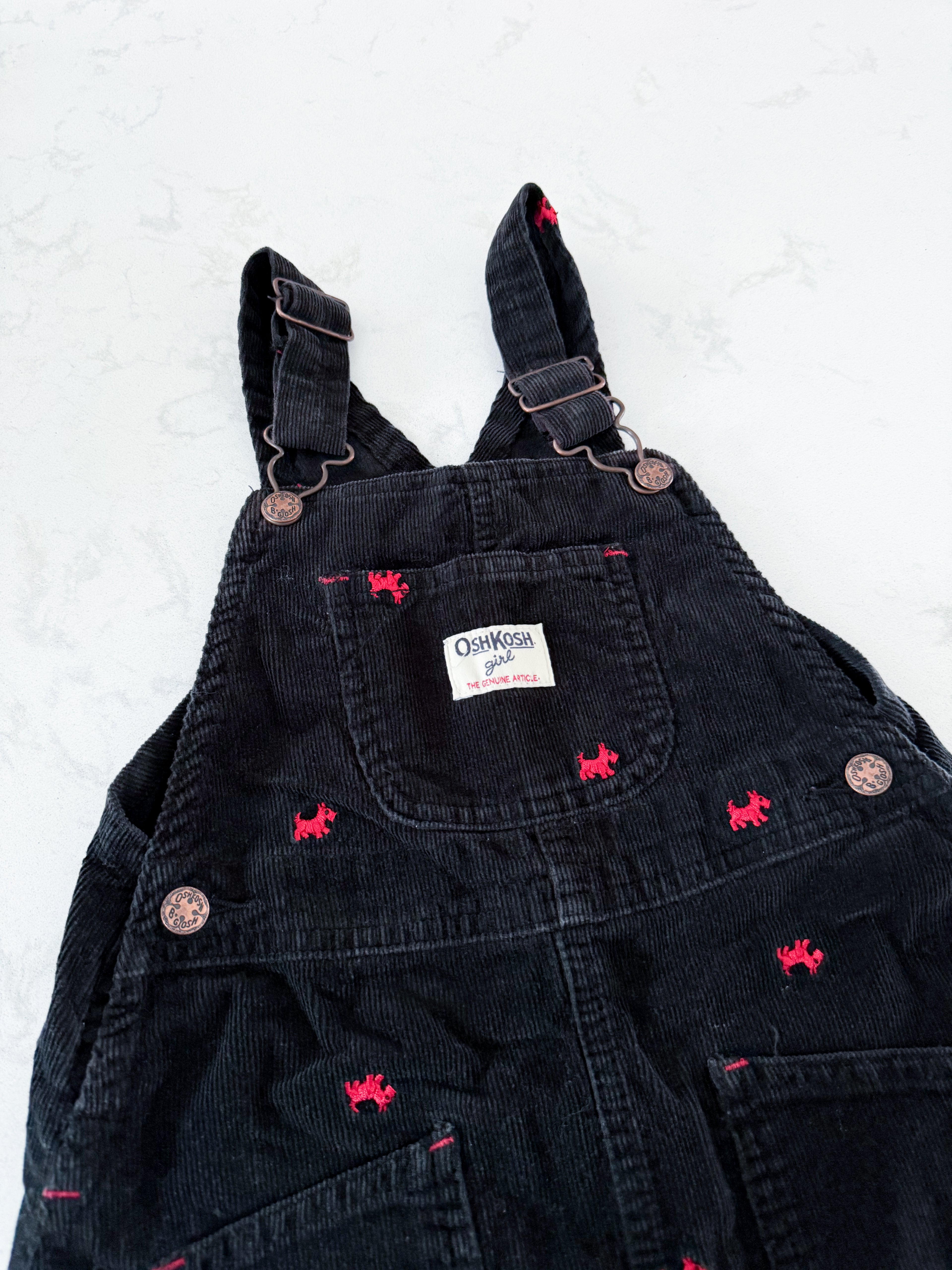Oshkosh (1996-2002)- 5T- GUC- black corduroy overall dress with embroidered red dogs