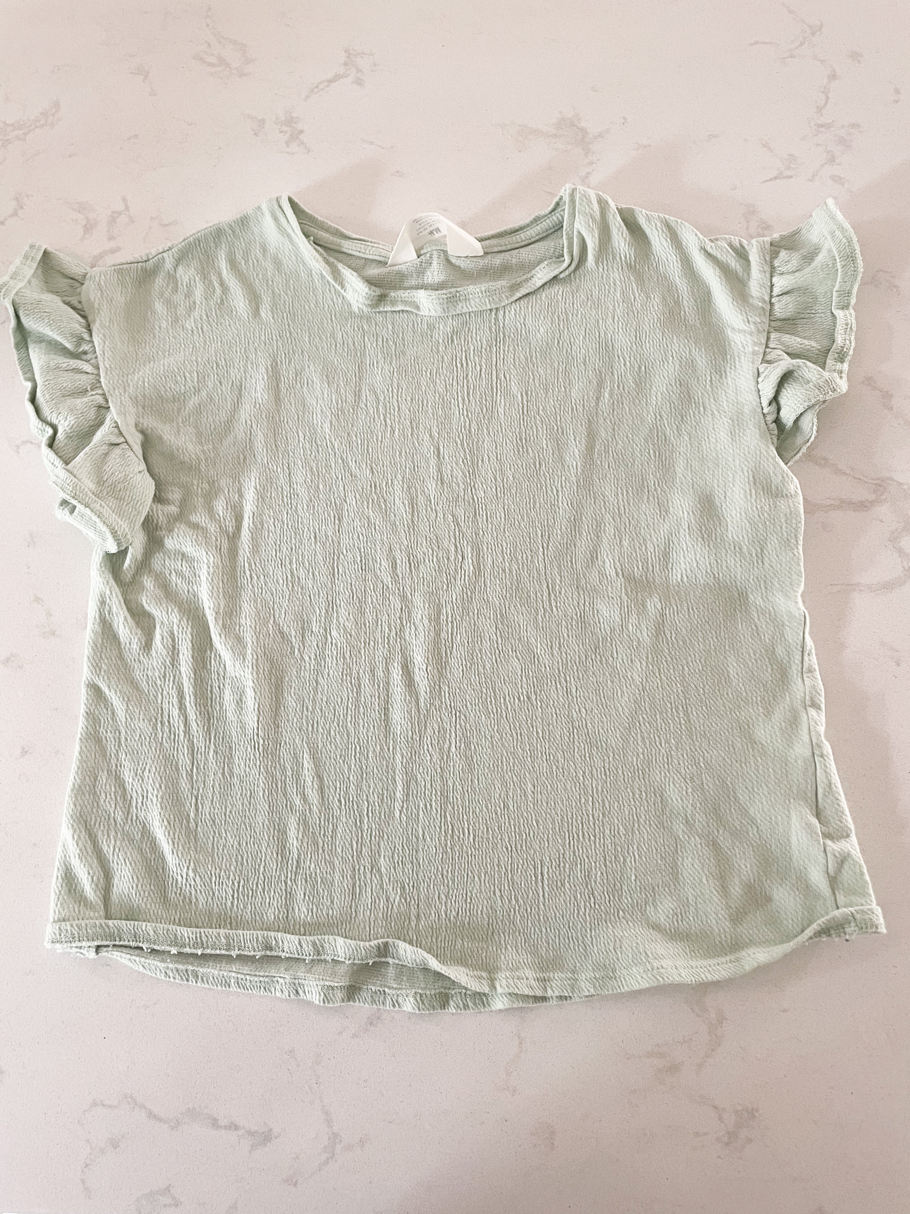 H&M- 7Y- VGUC- mint green ruffle sleeve t shirt