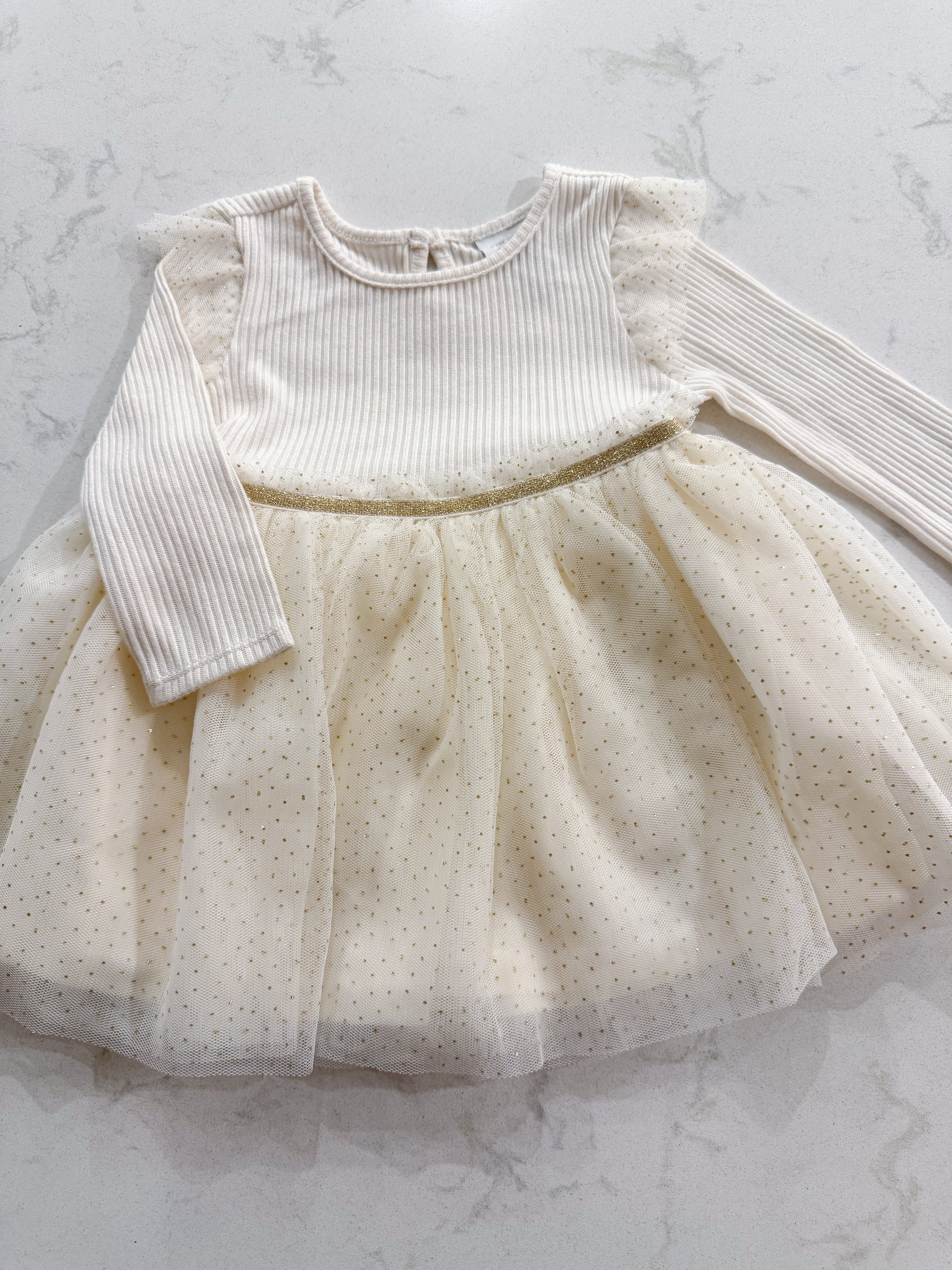 The Children’s Place- 9-12m- VGUC- long sleeve ribbed dress with gold sparkly tulle skirt
