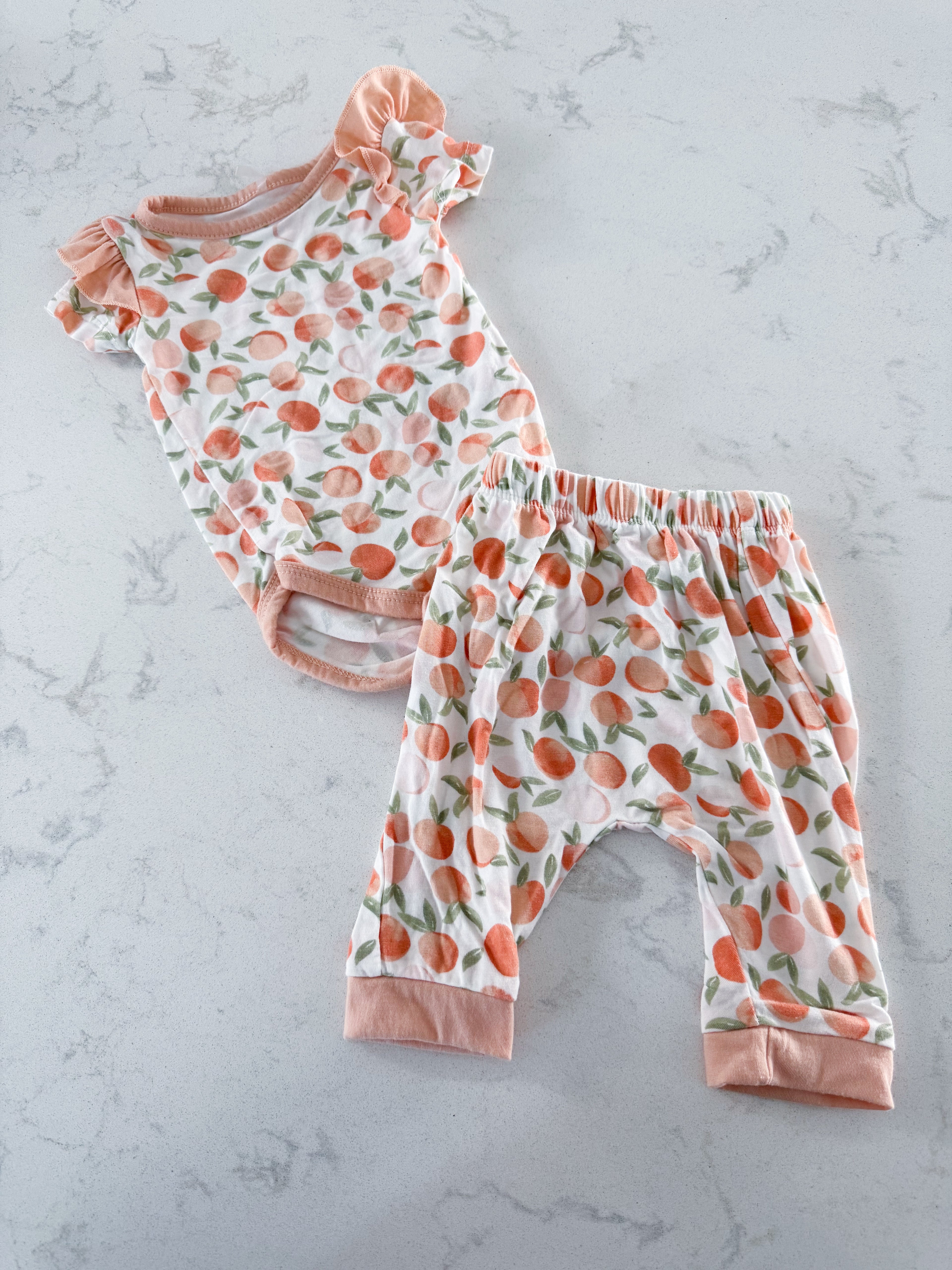 Milkberry-0-3m- VGUC- two piece bamboo set with peaches