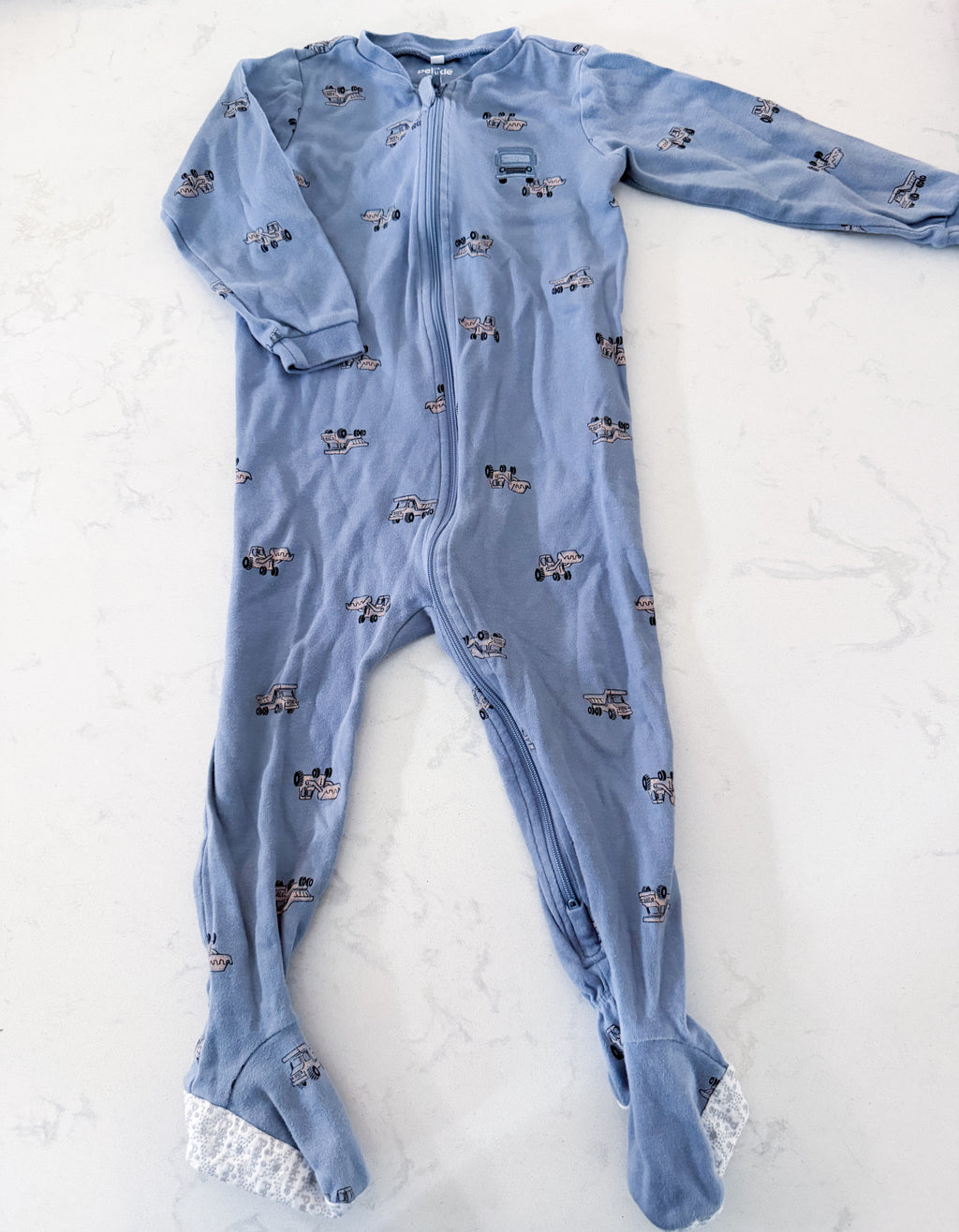 Pekkle- 24m- GUC- light blue zip up footie Jammies with embroidered construction trucks