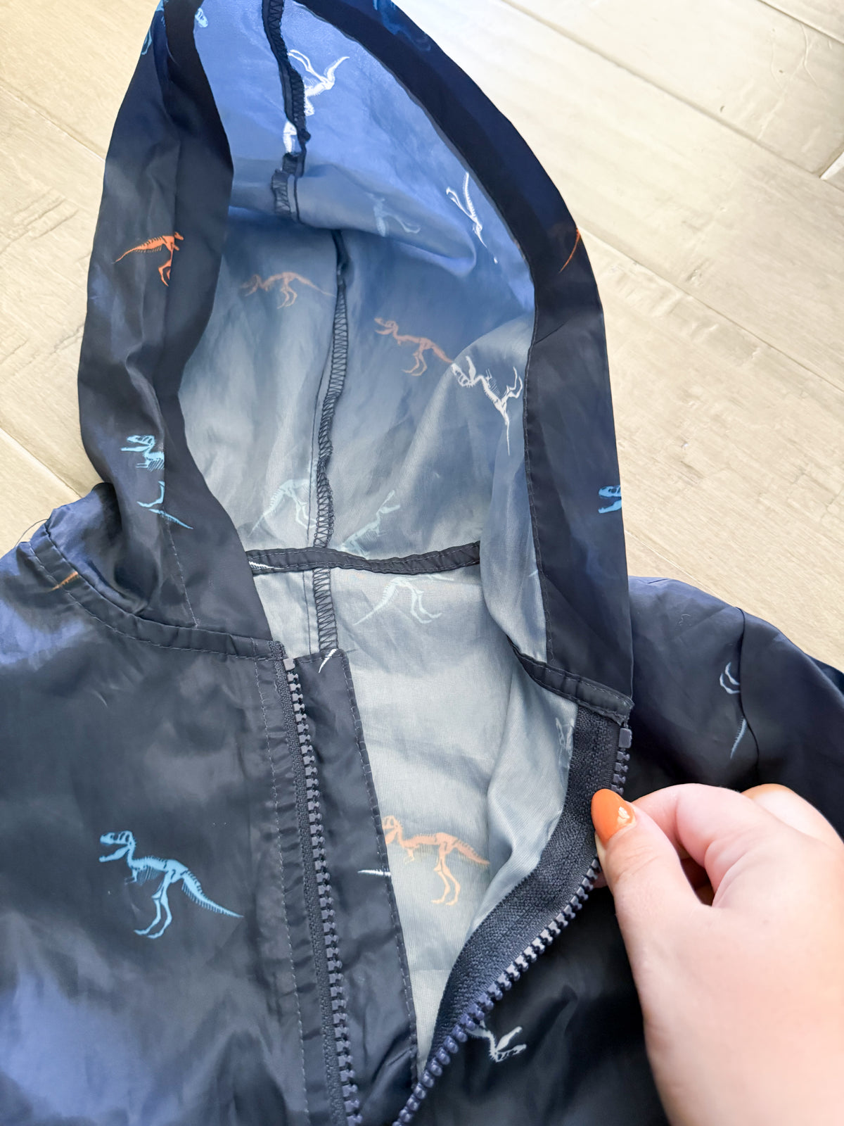 George- 2T- VGUC- navy blue thin splash suit with dino pattern