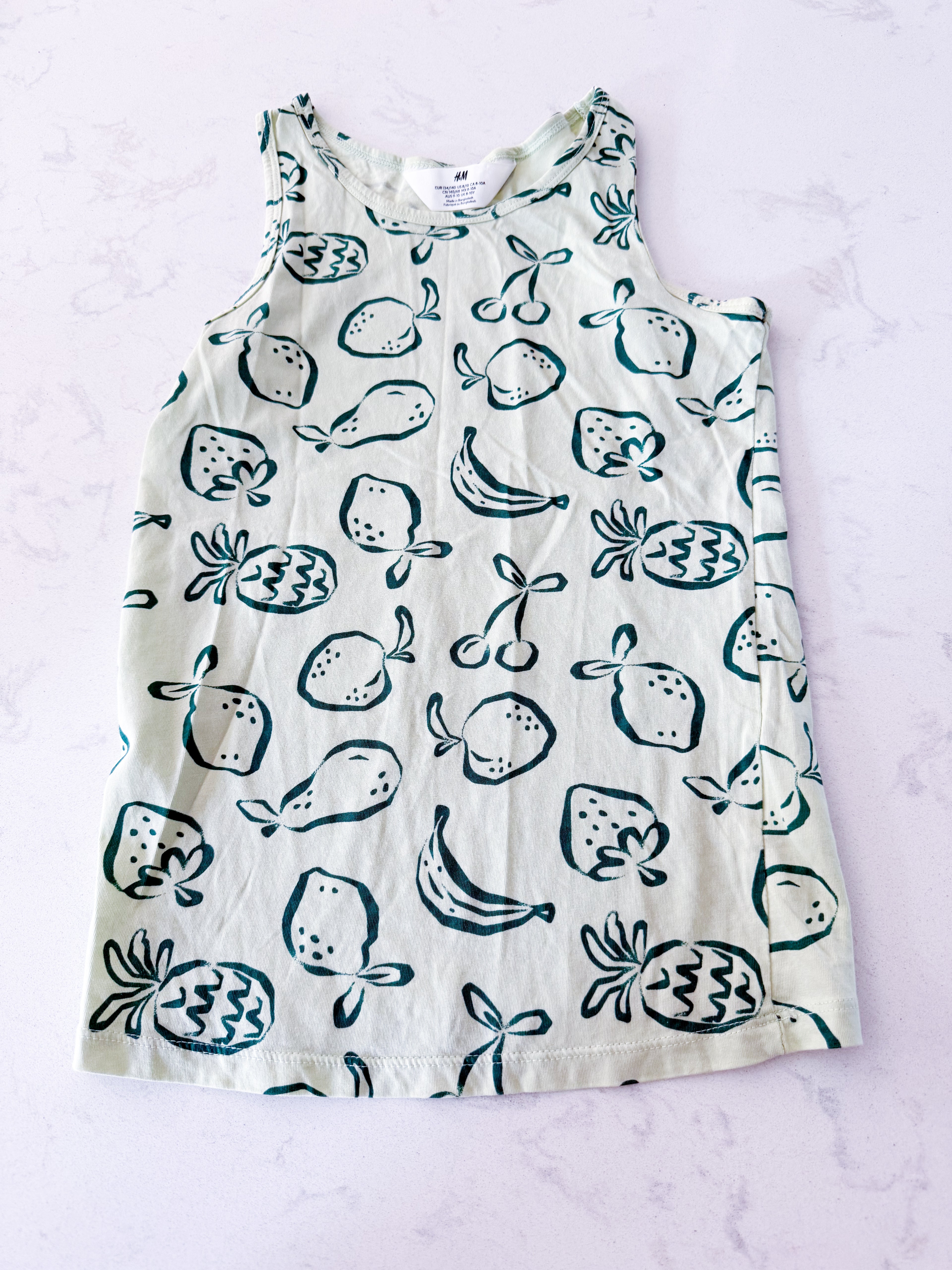 H&M- 8-10Y- VGUC- green tank top with dark green fruit pattern