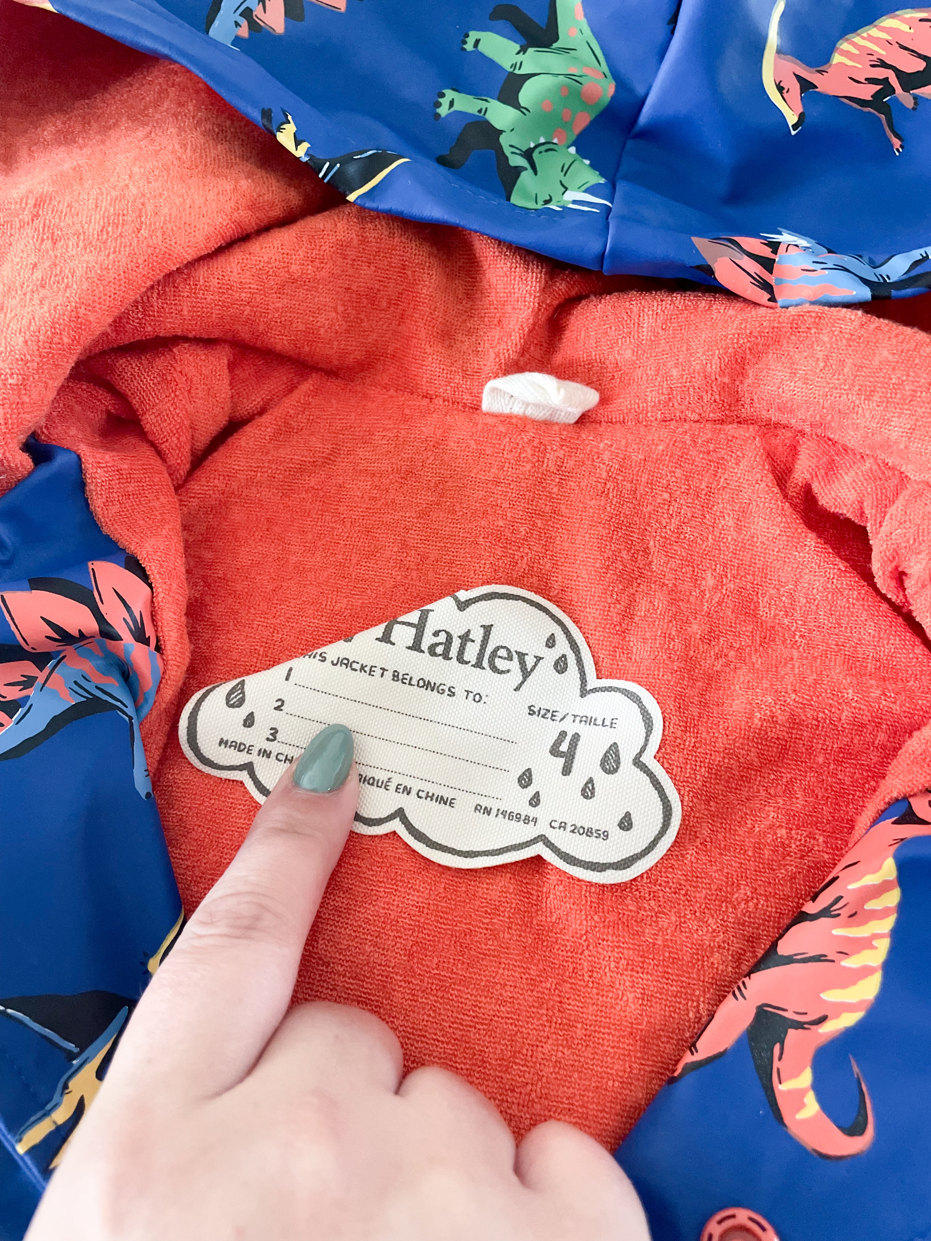 Hatley-4T-GUC-blue Rain coat with dinosaurs and Terry towel lining