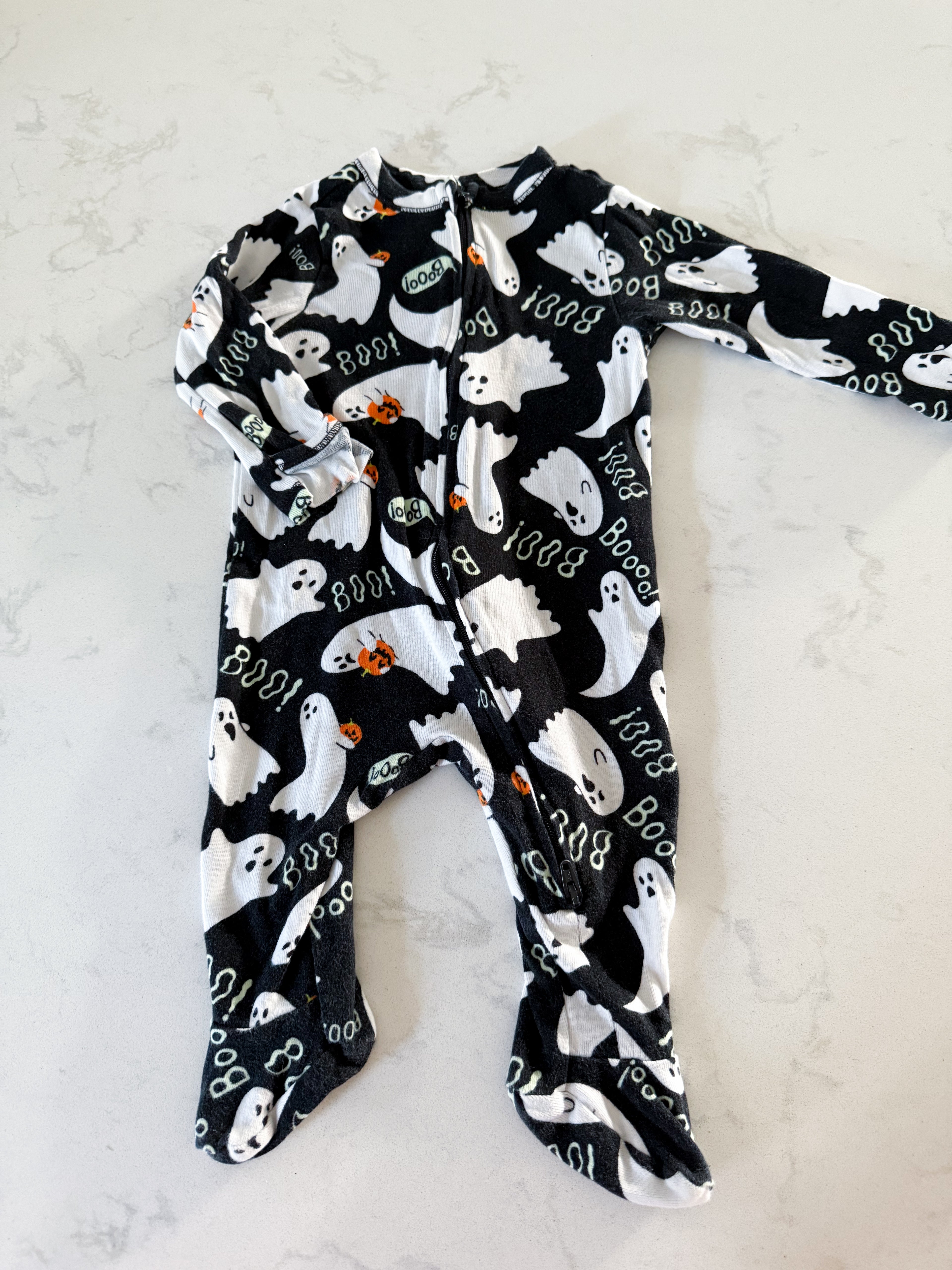 Old Navy- 3-6m- GUC- black footie pajamas with ghosts