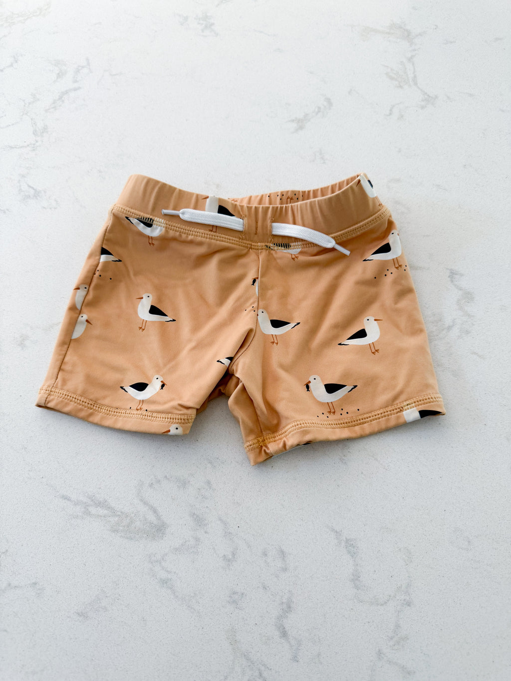 First by Petit Lem- 18-24m (fits tight)- VGUC- Sandy orange swim shorts with seagulls