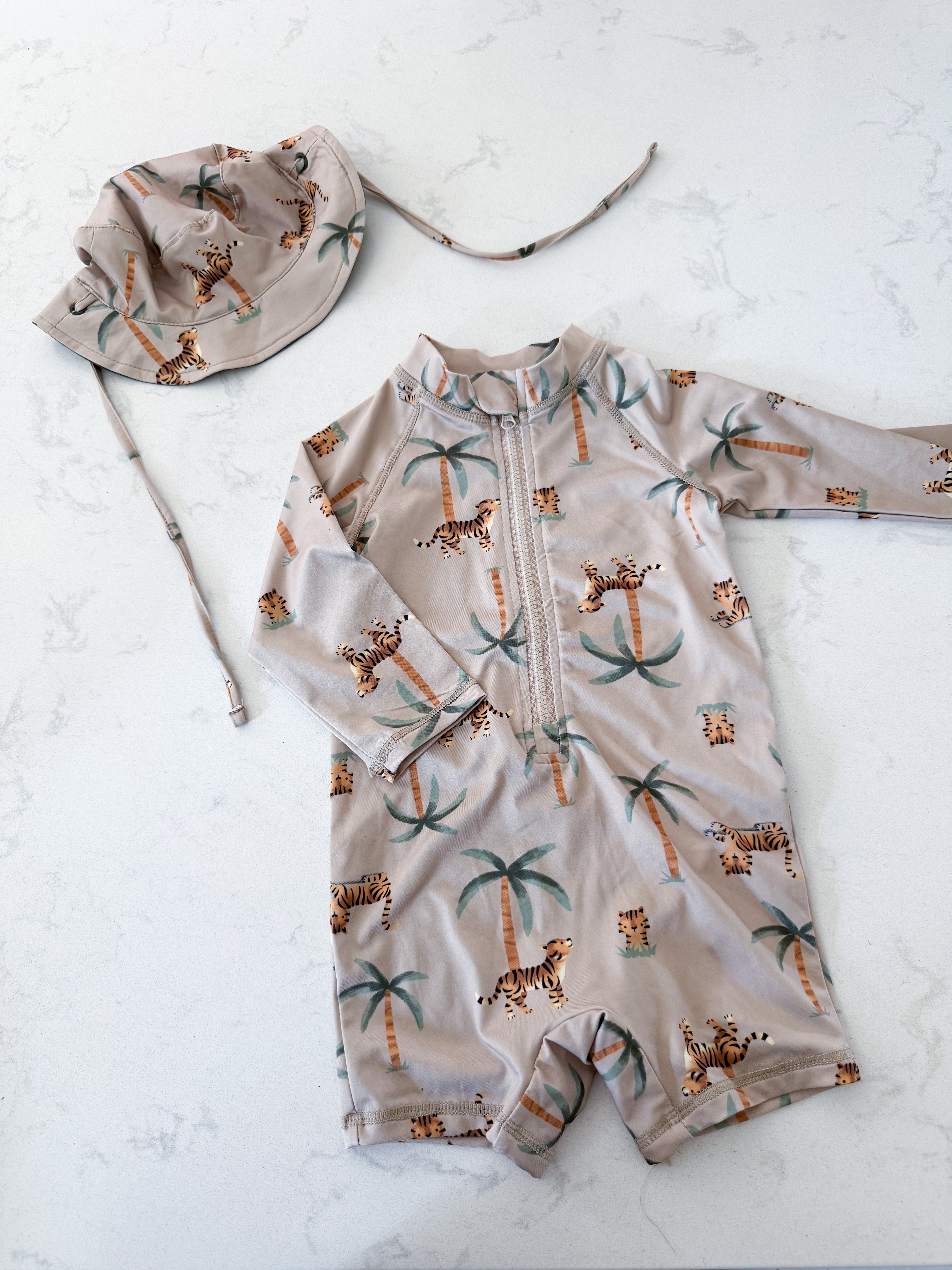 Petit Lem- 12m- VGUC- brown swim suit with tigers and matching swim hat