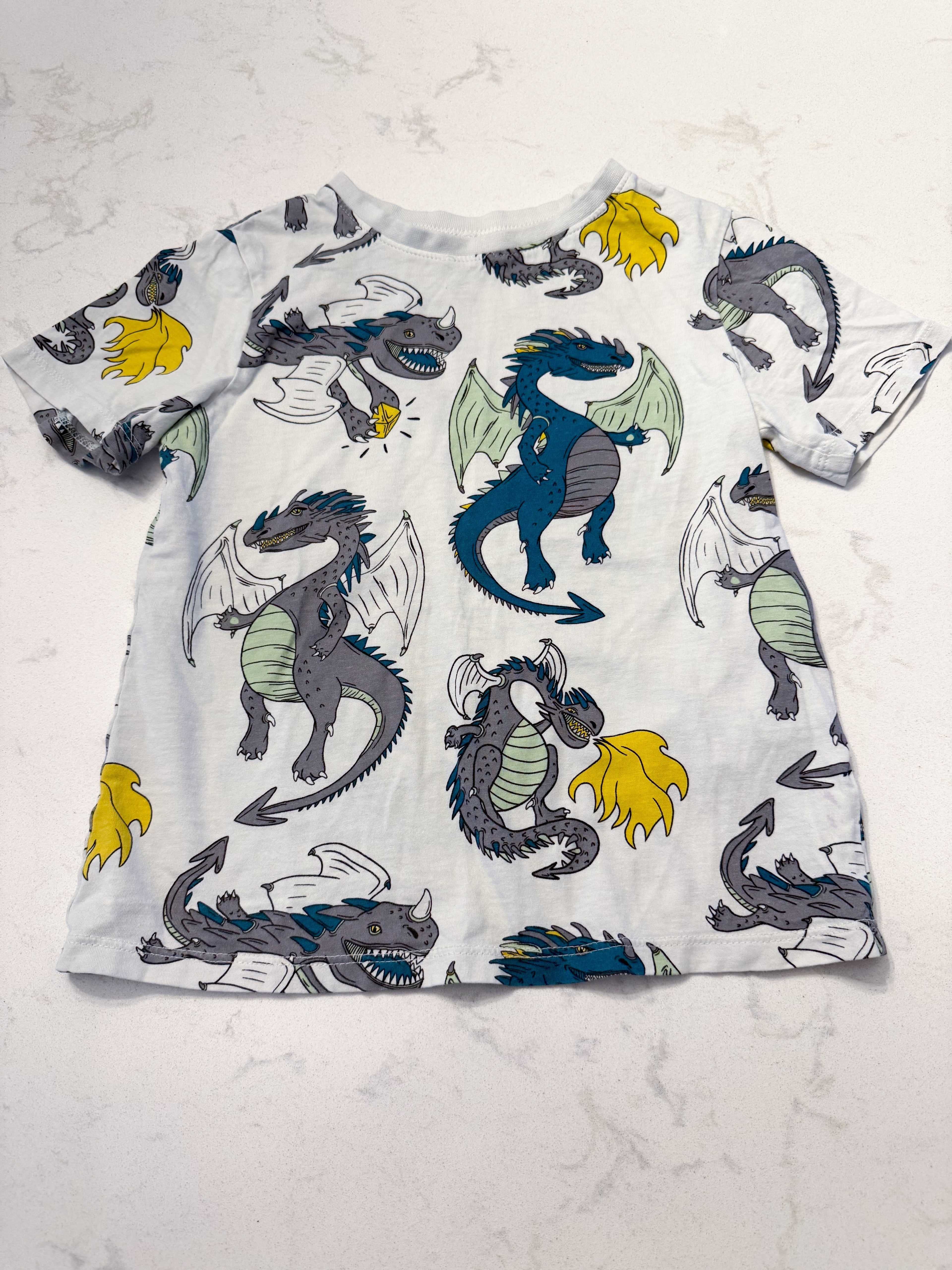 H&M- 5/6T- GUC- white t shirt with dragons all over