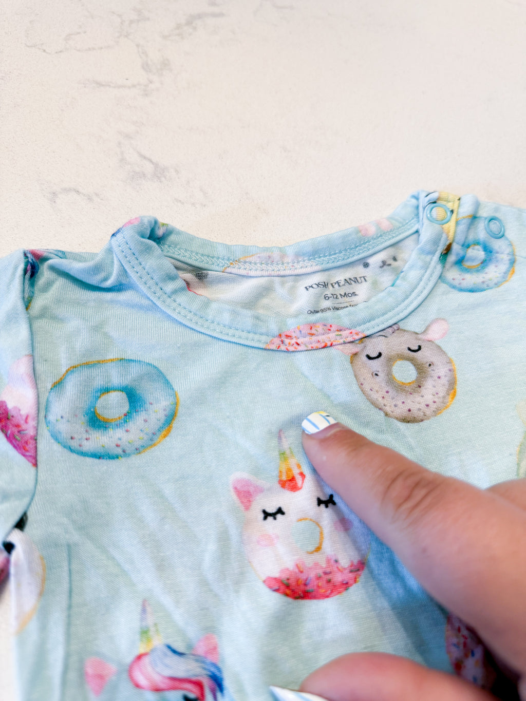 Posh Peanut- 6-12m- PLAY- ice blue short sleeve twirl bodysuit with donut pattern