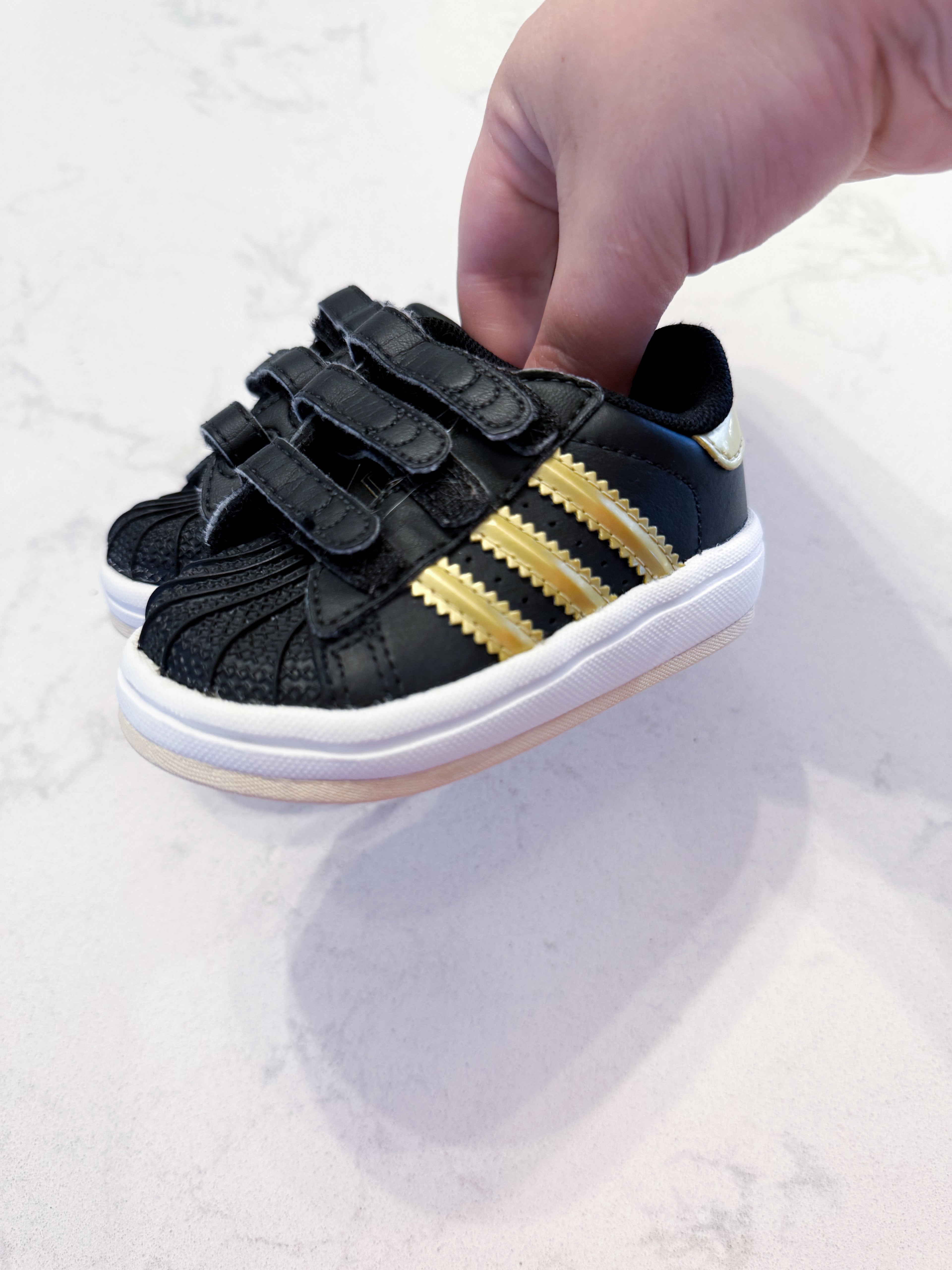 Adidas- 3C- VGUC- black Velcro shoes with gold accents