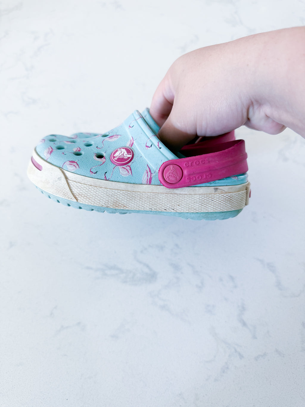 Crocs- 8/9C- PLAY- light blue slip ons with pink flamingos